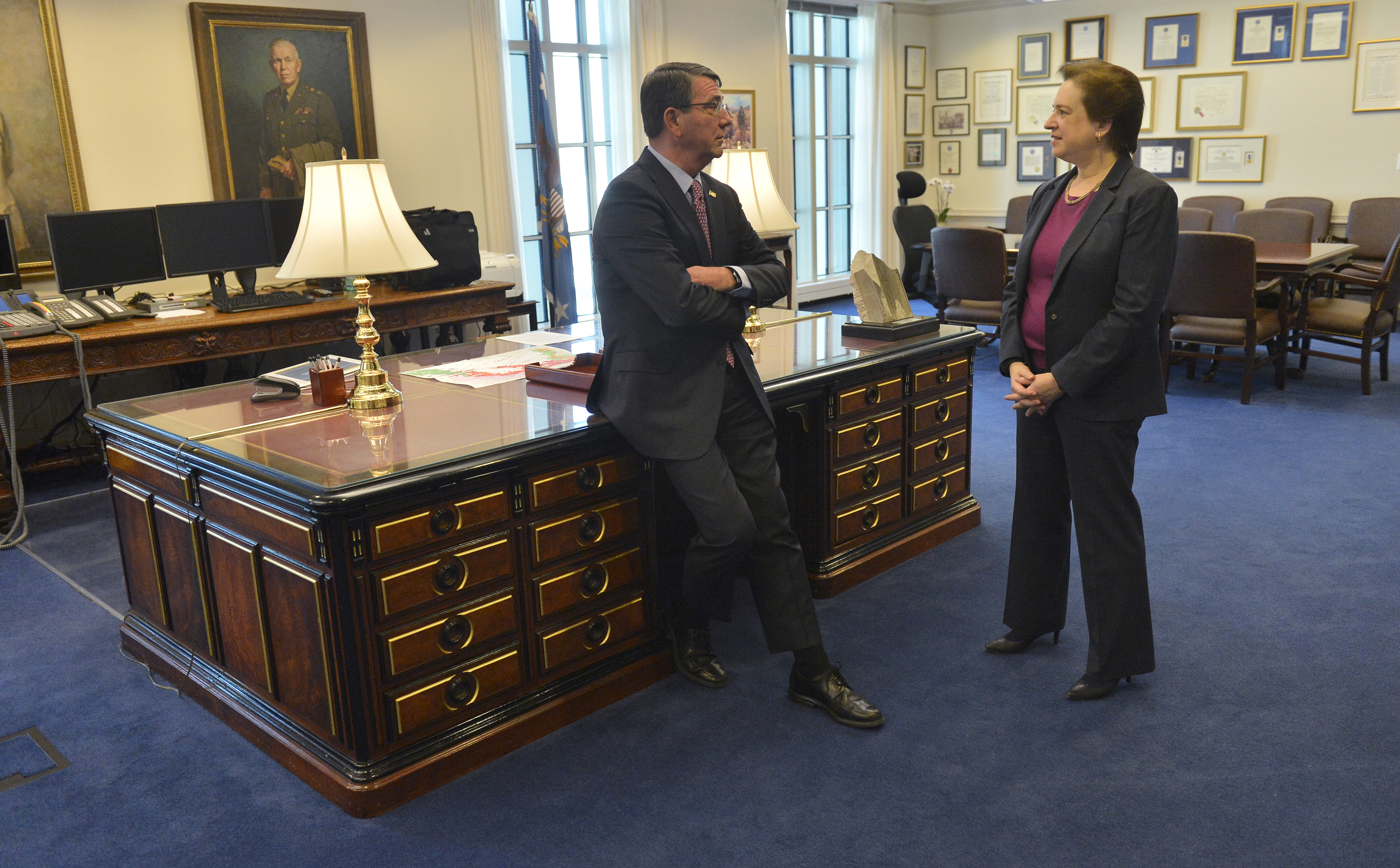 Supreme Court Justice Elena Kagan and Defense Secretary Ash Carter talk in Carter's  office before his