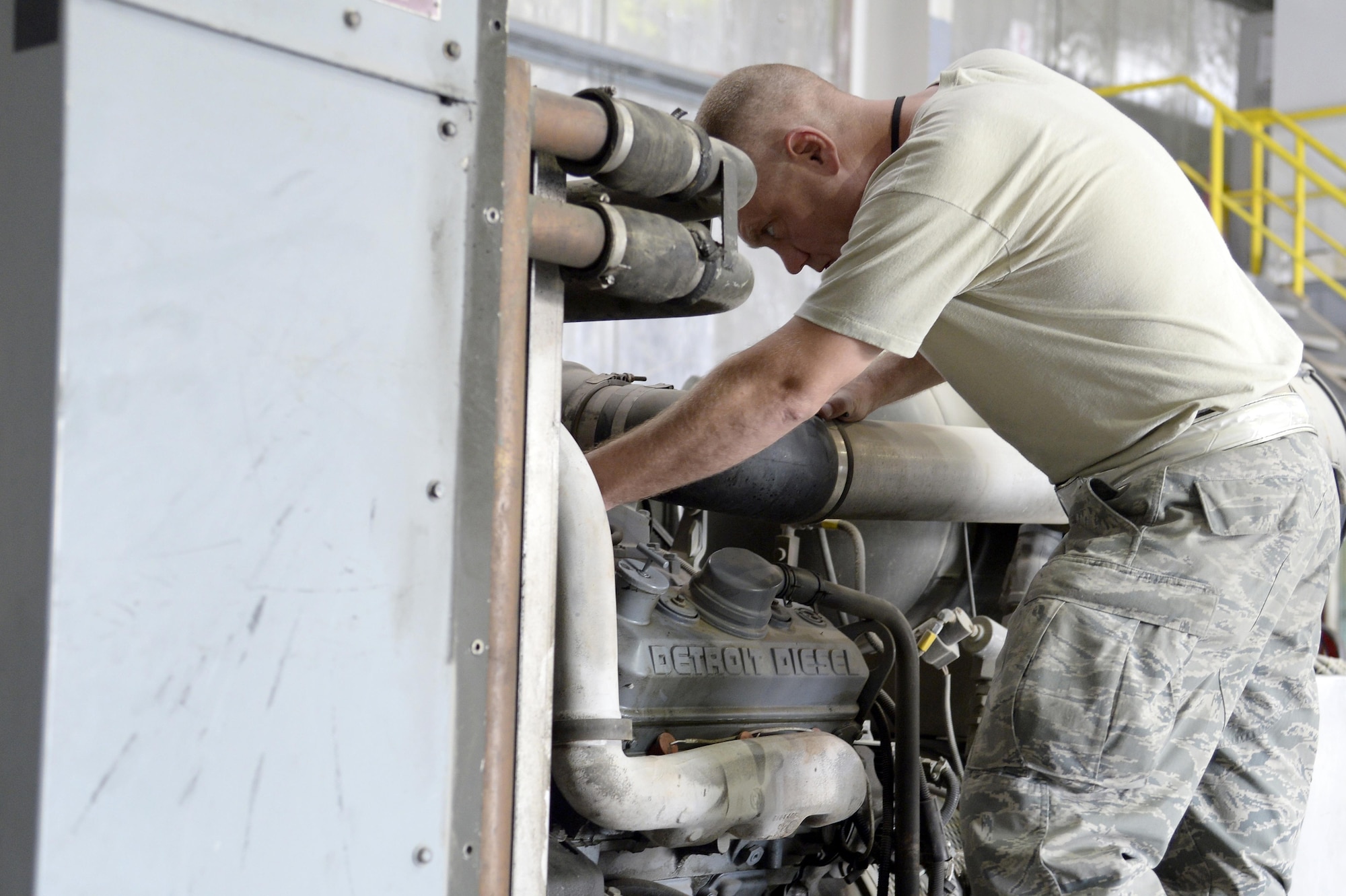 Staff Sgt. Nicholas, Aerospace Ground Equipment assistant floor lead, performs an inspection on an A/M32A-103 Generator at an undisclosed location in Southwest Asia Mar. 4, 2015. AGE Airmen provides the vital support to the flightline to basically sustain all the operation that go on out there. Nicholas is currently deployed from Seymour Johnson Air Force Base, N.C., and is a native of Geraldine, Ala. (U.S. Air Force photo/Tech. Sgt. Marie Brown) (RELEASED)