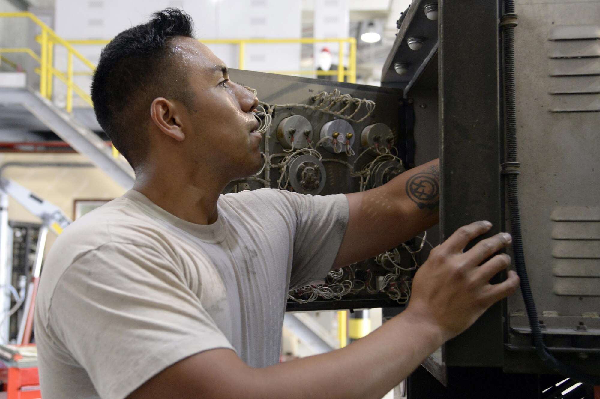 Staff Sgt. Jaime, aerospace ground equipment, performs a phase 2 inspection on an A/M32A-103 Generator at an undisclosed location in Southwest Asia Mar. 4, 2015.AGE makes repairs on equipment from diesel engine changes to trouble shooting electrical systems and integrated circuit cards. Jaime is currently deployed from Tinker Air Force Base, Okla., and is native of Oklahoma City, Okla.  (U.S. Air Force photo/Tech. Sgt. Marie Brown) (RELEASED)