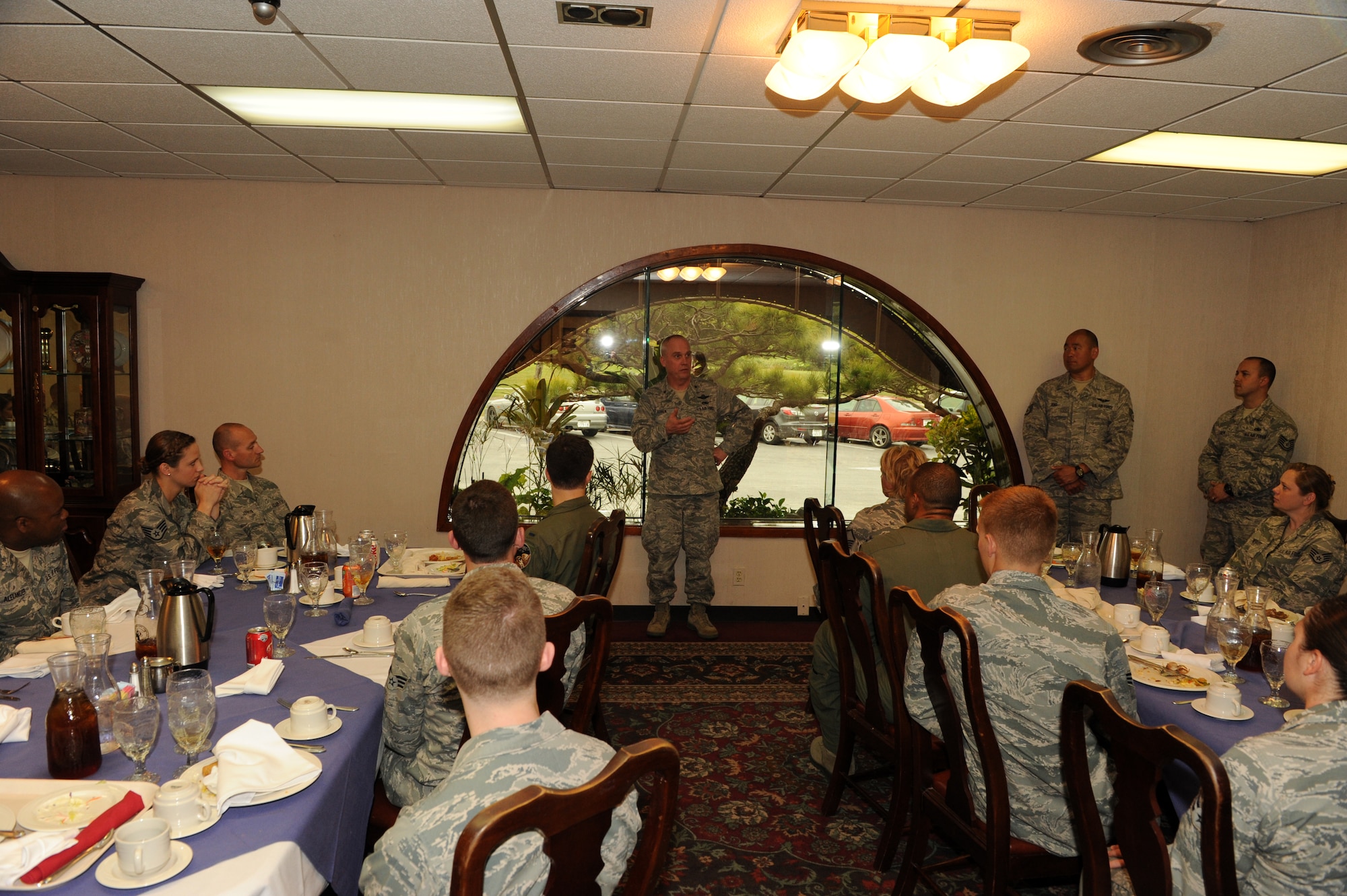 U.S. Air Force Brig. Gen. Gary Ebben, Wisconsin National Guard assistant adjutant general, speaks to members of the 115th Fighter Wing from the Wisconsin Air National Guard during a lunch at the Officer’s Club on Kadena Air Base, Japan, March 4, 2015. During the lunch, a few awards were given out and a lieutenant was promoted to captain. (U.S. Air Force photo by Airman 1st Class Stephen G. Eigel)  