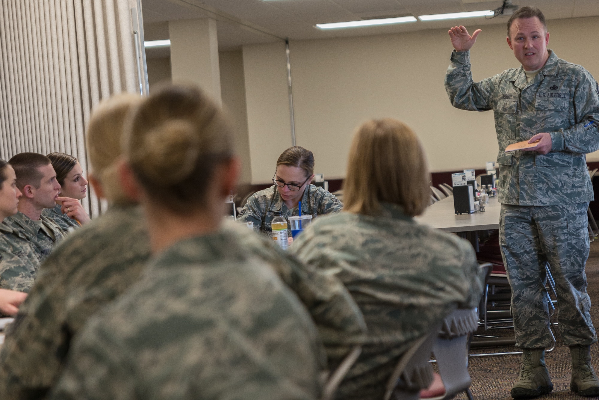 153rd Airlift Wing Command Chief Master Sgt. Michael D. Abbott spoke to about 20 enlisted members of the Rising 6 organization on the topic of managing a successful career in the Air National Guard, Mar. 7, 2015 at Cheyenne Air National Guard Base in Cheyenne, Wyoming. Rising 6 members consist of Airman in the ranks of Airman Basic to Tech. Sgt. who inform leaders of issues which impact involving Airmen and noncommissioned officers. (U.S. Air National Guard photo by Tech. Sgt. Galvin/released)