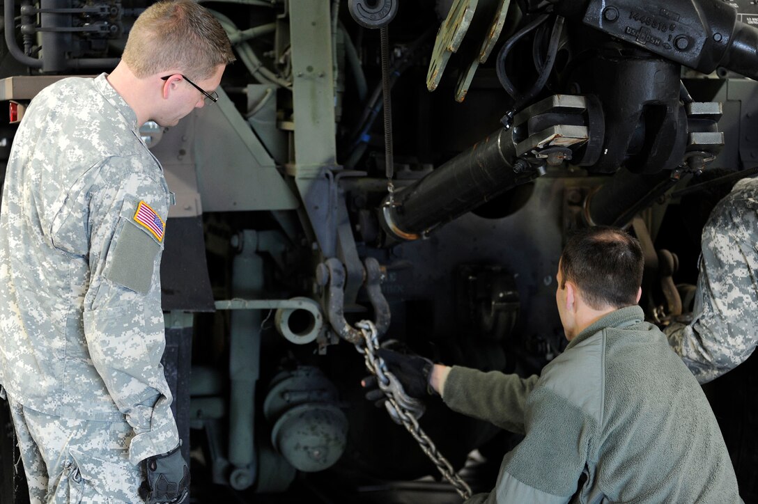 Airmen from the 317th Airlift Squadron, 38th and 81st Aerial Port Squadrons conduct a joint training scenario with the 1189th Transportation Brigade and the 941st Transportation Company at Joint Base Charleston – Air Base, S.C. March 7-8, 2015. This is the first time these units have facilitated this type of training where both branches of service worked side-by-side, executing weight and balance of vehicles, load planning, cargo buildup as well as the loading of equipment onto a C-17 Globemaster III. Soldiers and Airmen worked together over a two-day period to sharpen various transportation skills needed for their jobs. The 317 AS, 38 and 81 APS are assigned to the 315th Airlift Wing. The 1189th TSB and the 941st TSC are Reserve units that operate out of the JB Charleston – Weapons Station. (U.S. Air Force photo by Staff Sgt. Bobby Pilch)