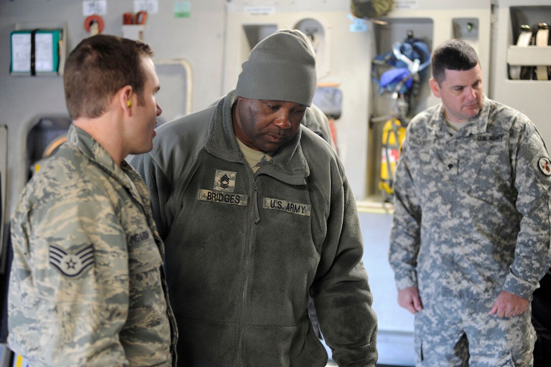 Airmen from the 317th Airlift Squadron, 38th and 81st Aerial Port Squadrons conduct a joint training scenario with the 1189th Transportation Brigade and the 941st Transportation Company at Joint Base Charleston – Air Base, S.C. March 7-8, 2015. This is the first time these units have facilitated this type of training where both branches of service worked side-by-side, executing weight and balance of vehicles, load planning, cargo buildup as well as the loading of equipment onto a C-17 Globemaster III. Soldiers and Airmen worked together over a two-day period to sharpen various transportation skills needed for their jobs. The 317 AS, 38 and 81 APS are assigned to the 315th Airlift Wing. The 1189th TSB and the 941st TSC are Reserve units that operate out of the JB Charleston – Weapons Station. (U.S. Air Force photo by Staff Sgt. Bobby Pilch)