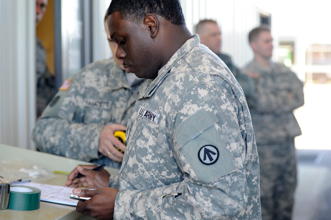 Airmen from the 317th Airlift Squadron, 38th and 81st Aerial Port Squadrons conduct a joint training scenario with the 1189th Transportation Brigade and the 941st Transportation Company at Joint Base Charleston – Air Base, S.C. March 7-8, 2015. This is the first time these units have facilitated this type of training where both branches of service worked side-by-side, executing weight and balance of vehicles, load planning, cargo buildup as well as the loading of equipment onto a C-17 Globemaster III. Soldiers and Airmen worked together over a two-day period to sharpen various transportation skills needed for their jobs. The 317 AS, 38 and 81 APS are assigned to the 315th Airlift Wing. The 1189th TSB and the 941st TSC are Reserve units that operate out of the JB Charleston – Weapons Station. (U.S. Air Force photo by Staff Sgt. Bobby Pilch)