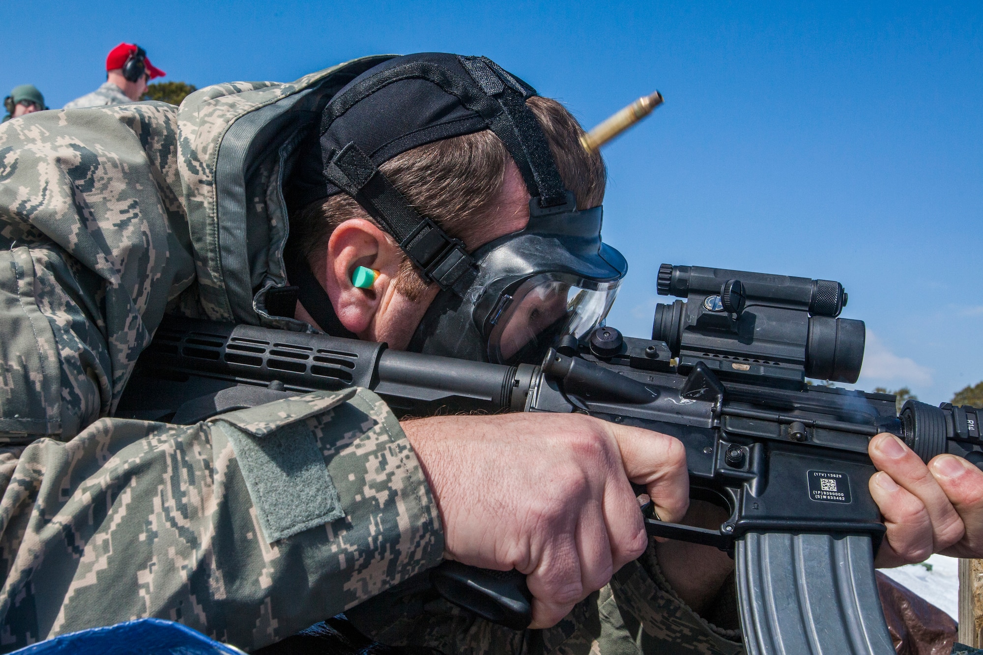 Tech. Sgt. Brian Waldron, 108th Wing, New Jersey Air National Guard, qualifies on the M4 Carbine at Joint Base McGuire-Dix-Lakehurst, N.J., March 8, 2015. (U.S. Air National Guard photo by Master Sgt. Mark C. Olsen/Released)