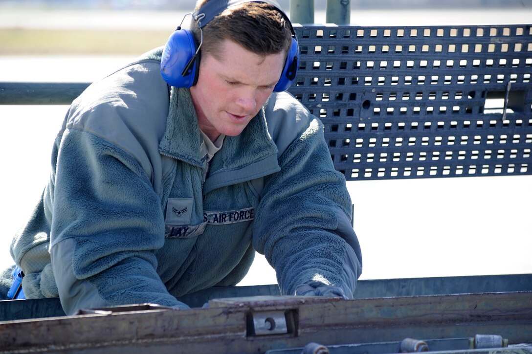 Airmen from the 81st Aerial Port Squadron at Joint Base Charleston, South Carolina trained with members from the 934th Airlift Wing's 27 APS, Minneapolis-St. Paul International Airport Air Reserve Station, Minn. here March 7-8, 2015.  The purpose of the joint training was to allow Airmen from the 81 APS an opportunity to practice loading and off-loading a C-130 aircraft while also preparing for the upcoming Port Dawg Challenge.  Airmen from the 27 APS were exposed to the Global Air Transpiration Execution System, a single post/terminal processing and management system for the Department of Defense. (U.S. Air Force photo by Staff Sgt. Bobby Pilch)