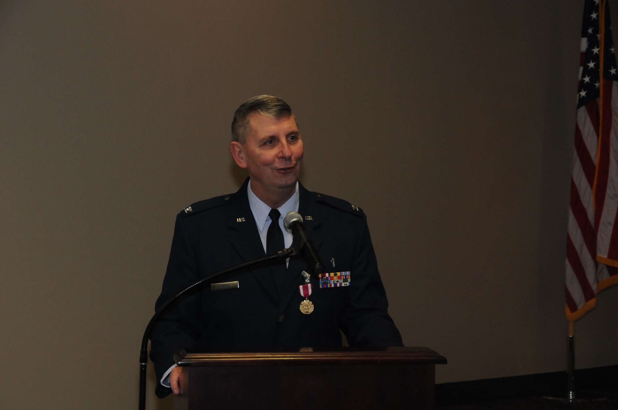 Chaplain Tom Smith was promoted to the rank of colonel, March 7, 2015, during a formal pinning ceremony presided by Brig. Gen. (ret.) H. D. McCarty held at Ebbing Air National Guard Base, Fort Smith, Ark. Smith served as a chaplain for more than 30 years and recently assumed the position of Joint Force Headquarters Command chaplain for the state of Arkansas. (U.S. Air National Guard photo by Senior Airman Cody Martin/released)