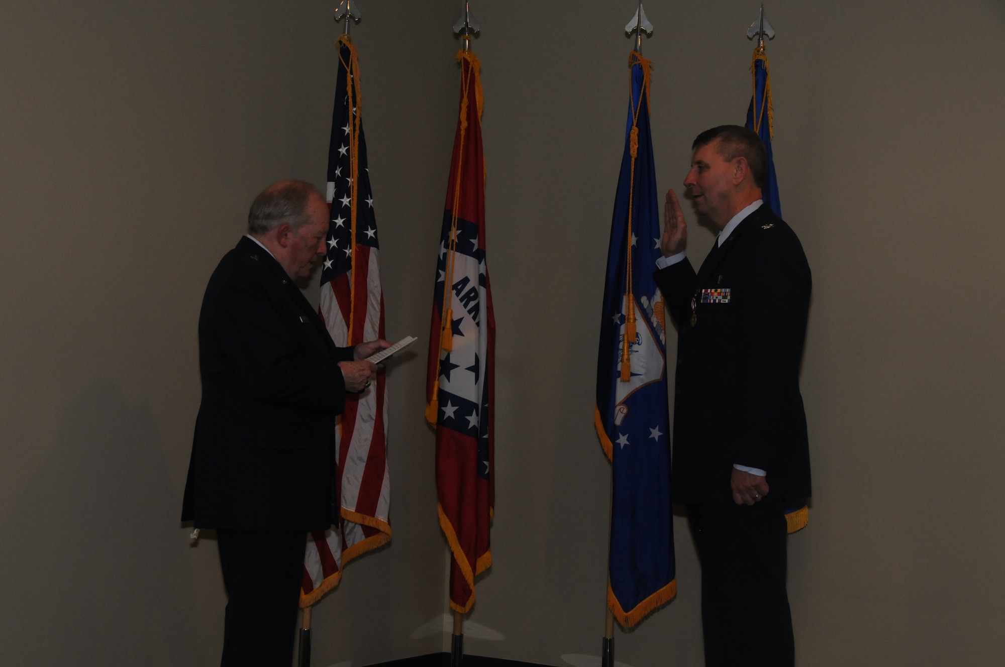 Chaplain Tom Smith was promoted to the rank of colonel, March 7, 2015, during a formal pinning ceremony presided by Brig. Gen. (ret) H. D. McCarty held at Ebbing Air National Guard Base, Fort Smith, Ark. Smith served as a chaplain for more than 30 years and recently assumed the position of Joint Force Headquarters Command chaplain for the state of Arkansas. (U.S. Air National Guard photo by Senior Airman Cody Martin/released)