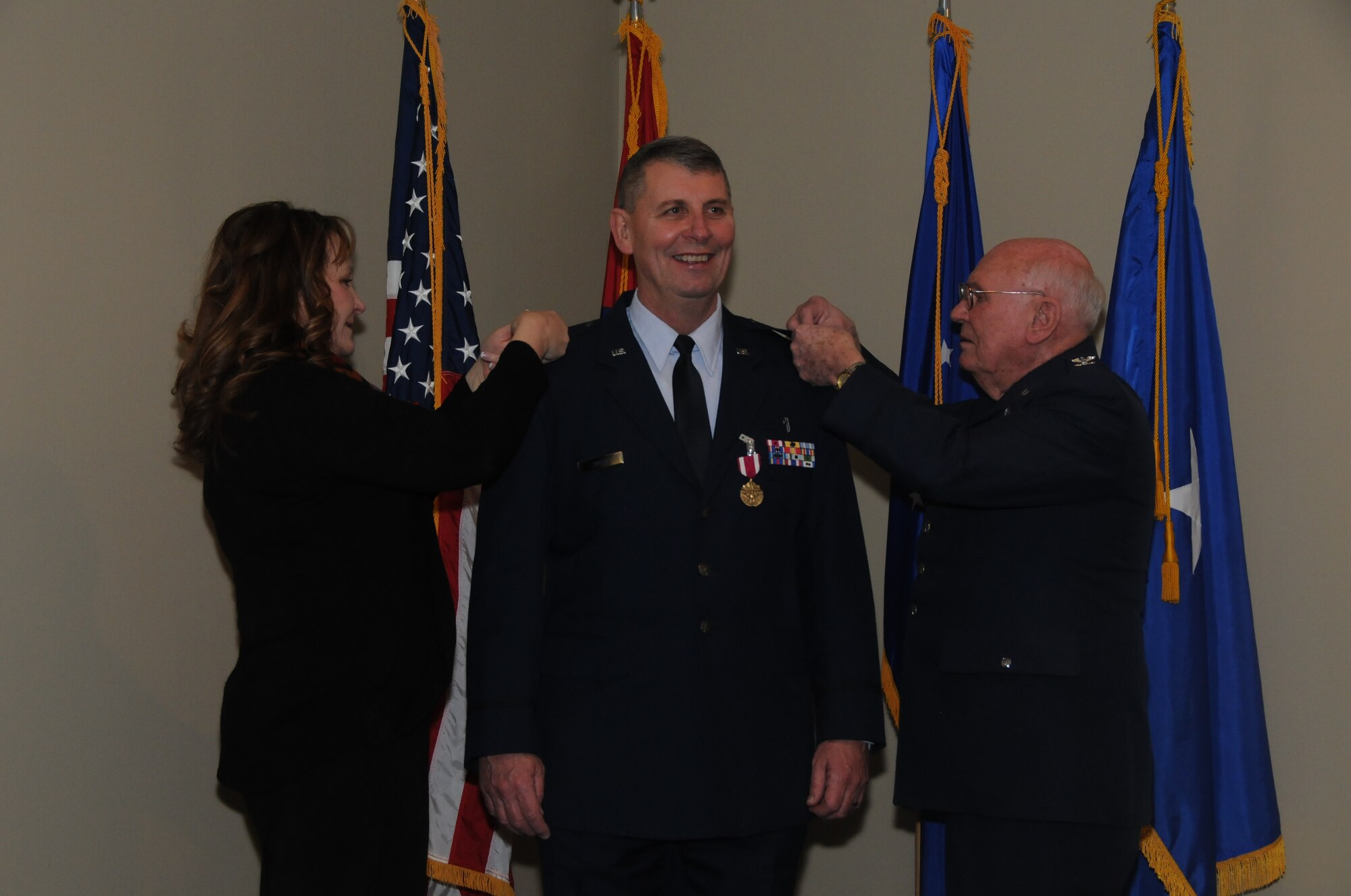 Chaplain Tom Smith was promoted to the rank of colonel, March 7, 2015, during a formal pinning ceremony presided by Brig. Gen. (ret) H. D. McCarty held at Ebbing Air National Guard Base, Fort Smith, Ark. Smith served as a chaplain for more than 30 years and recently assumed the position of Joint Force Headquarters Command chaplain for the state of Arkansas. (U.S. Air National Guard photo by Senior Airman Cody Martin/released)