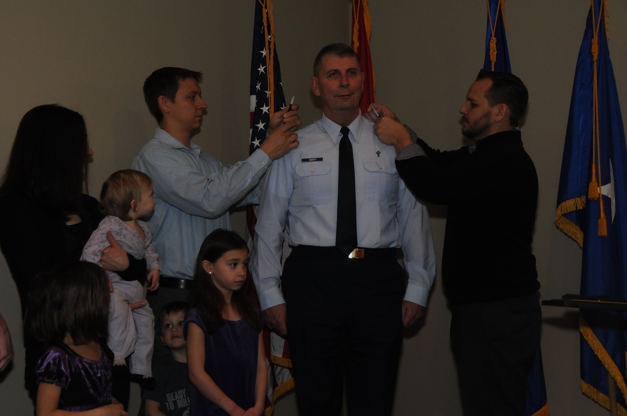 Chaplain Tom Smith was promoted to the rank of colonel, March 7, 2015, during a formal pinning ceremony presided by Brig. Gen. (ret) H. D. McCarty held at Ebbing Air National Guard Base, Fort Smith, Ark. Smith served as a chaplain for more than 30 years and recently assumed the position of Joint Force Headquarters Command chaplain for the state of Arkansas. (U.S. Air National Guard photo by Senior Airman Cody Martin/released)