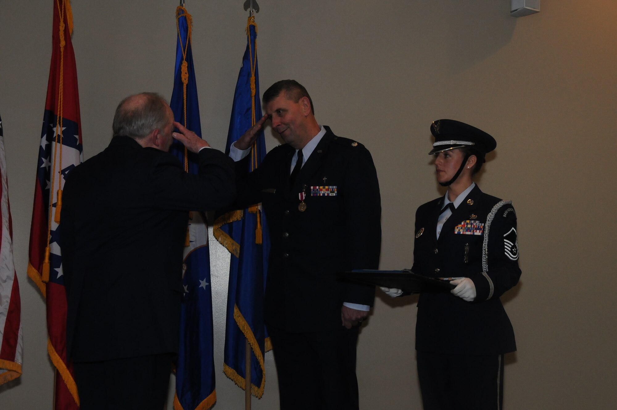 Chaplain Tom Smith was promoted to the rank of colonel, March 7, 2015, during a formal pinning ceremony presided by Brig. Gen. (ret) H. D. McCarty held at Ebbing Air National Guard Base, Fort Smith, Ark. Smith served as a chaplain for more than 30 years and recently assumed the position of Joint Force Headquarters Command chaplain for the state of Arkansas. (U.S. Air National Guard photo by Senior Airman Cody Martin/released)