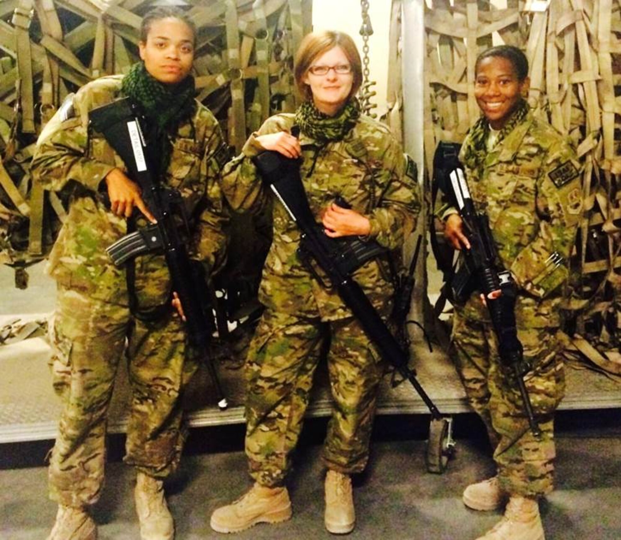 (From left to right) 512th Airlift Wing reservists with the 46th Aerial Port Squadron Tech Sgts. Patricia Thurston and Jill Fitzgerald, and Staff Sgt. Debra Thomas pose for a picture while deployed to Bagram Airfield. Members from the 46th APS deployed to Bagram in support of Operation Freedom’s Sentinel, the United States’ new mission on peacekeeping and counter-terrorism operations in Afghanistan. (Courtesy Photo)