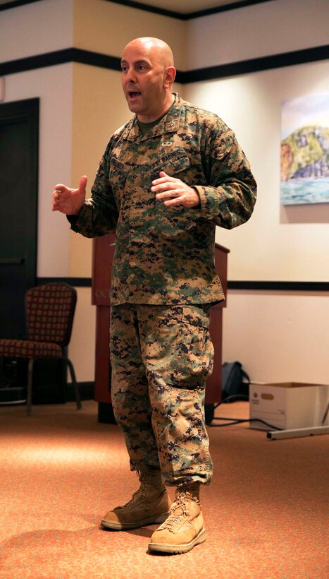 Col. Eric M. Mellinger talks about the importance of family readiness officers during his closing remarks of their annual training Feb. 26 at the Ocean Breeze on Camp Foster. The training was over the course of three days where they learned how to better communicate with families and commands, and better understand their roles as family readiness officers for III Marine Expeditionary Force. Mellinger stressed the importance for FROs overseas due to the number of deployments and exercises supported by III MEF. Mellinger a Newark, New Jersey, native, is the chief of staff for III Marine Expeditionary Force.