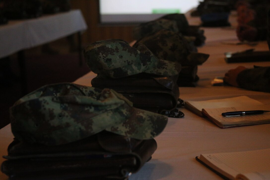 Senior noncommissioned officers from the Serbian Armed Forces attending a NCO Workshop worked with four U.S. Marines with Black Sea Rotational Force to share information about the noncommissioned officer rank at the Serbian Armed Forces Training Center Pancevo, March 3 through 6, 2015. These military-to-military engagements between the U.S. and Serbian militaries allow for a greater understanding in Serbia’s effort toward NATO interoperability in the area of leader development. (U.S. Marine Corps photo by 1st Lt. Sarah E. Burns)