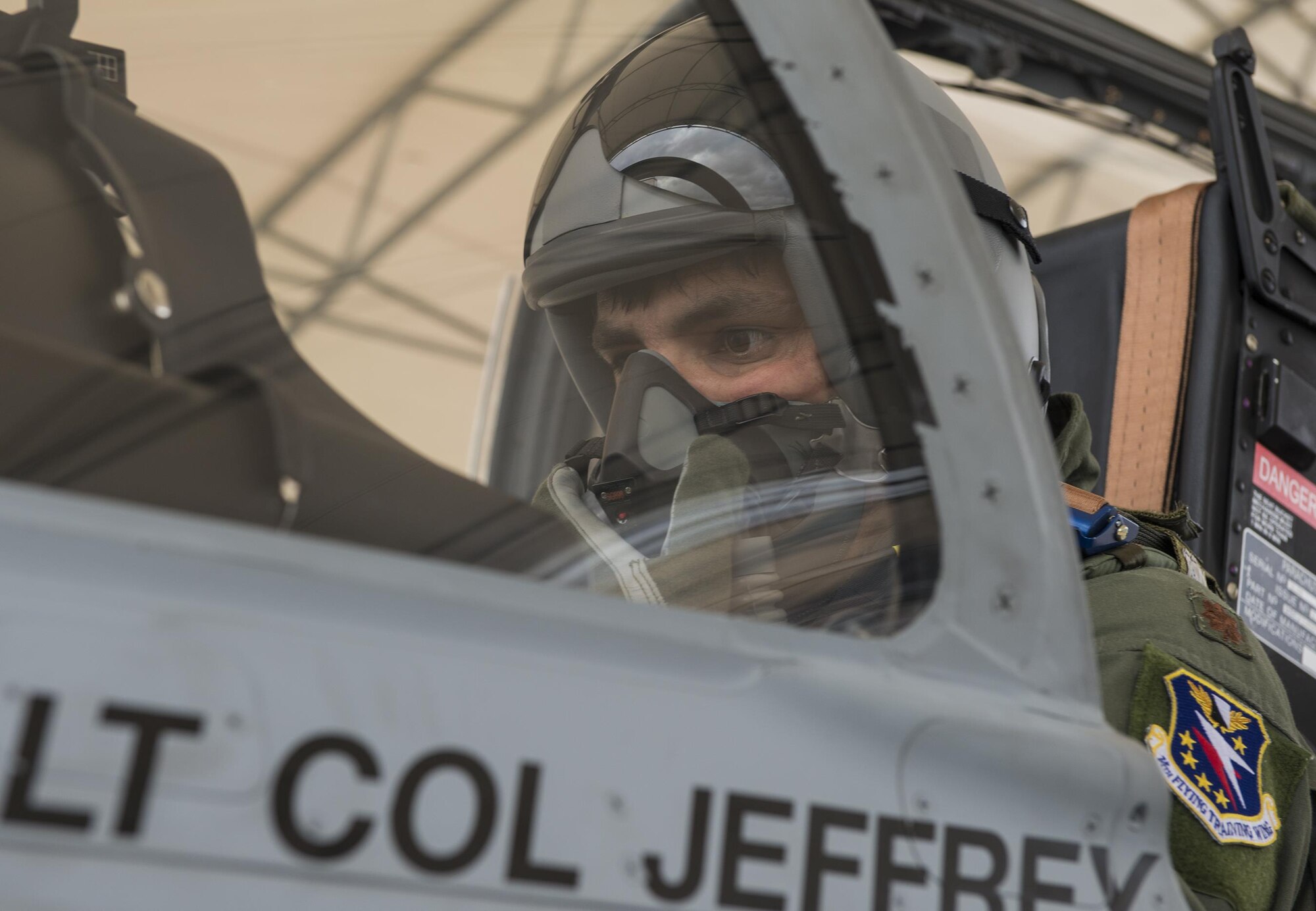 An Afghan Air Force student pilot from the 81st Fighter Squadron, sets up the communications panel before his first time flying an A-29 Super Tucano March 5, 2015, at Moody Air Force Base, Ga. The panel is used by pilots throughout the flight to communicate with the instructor. (U.S. Air Force photo by Airman 1st Class Ceaira Tinsley)