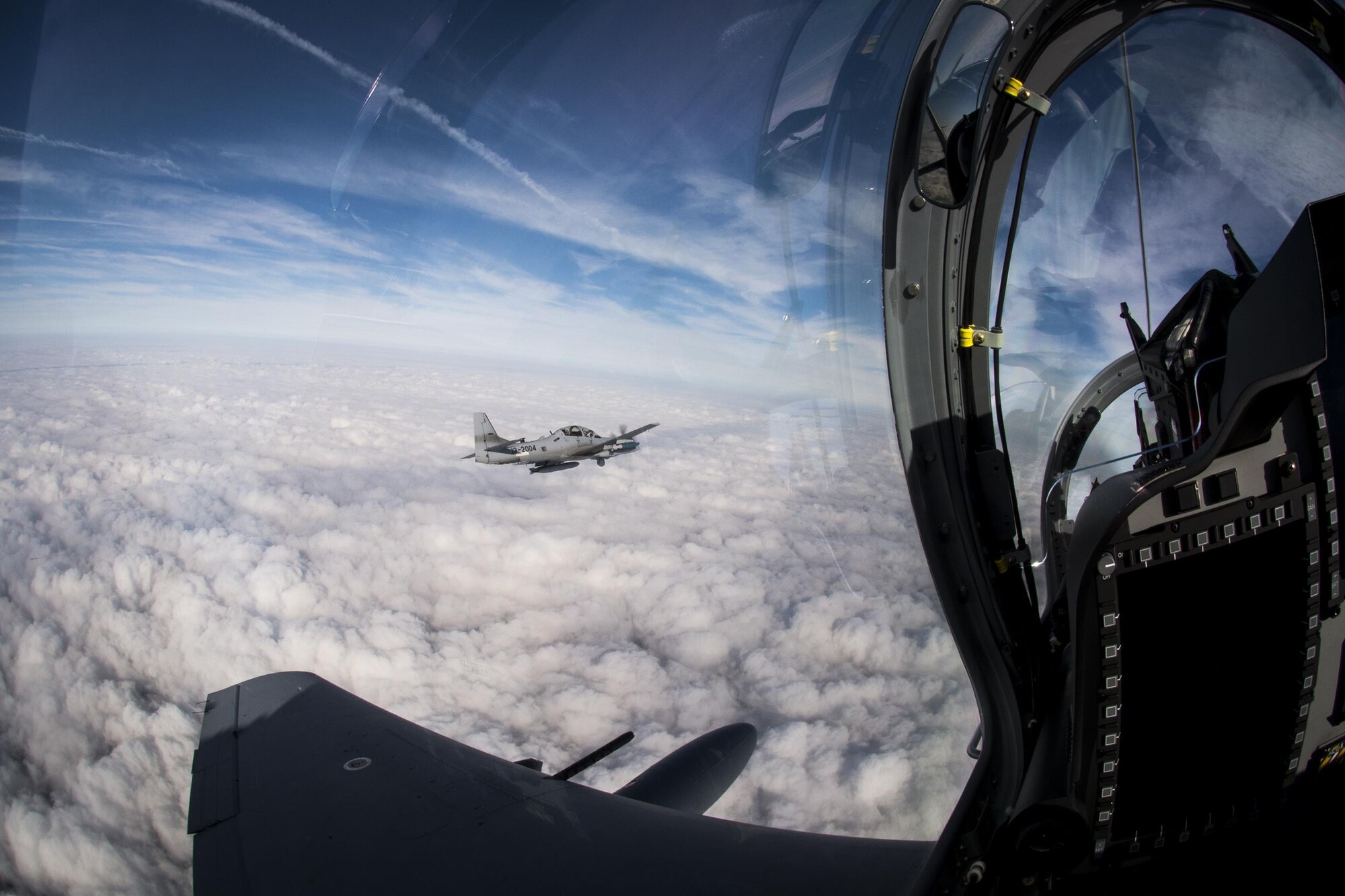 U.S. Air Force Capt. Matthew Clayton, 81st Fighter Squadron instructor pilot, flies an A-29 Super Tucano March 5, 2015, in the skies over Moody Air Force Base, Ga. The A-29 is a two-seat training aircraft flown by an instructor pilot and a student pilot. (U.S. Air Force Photo by Senior Airman Ryan Callaghan)