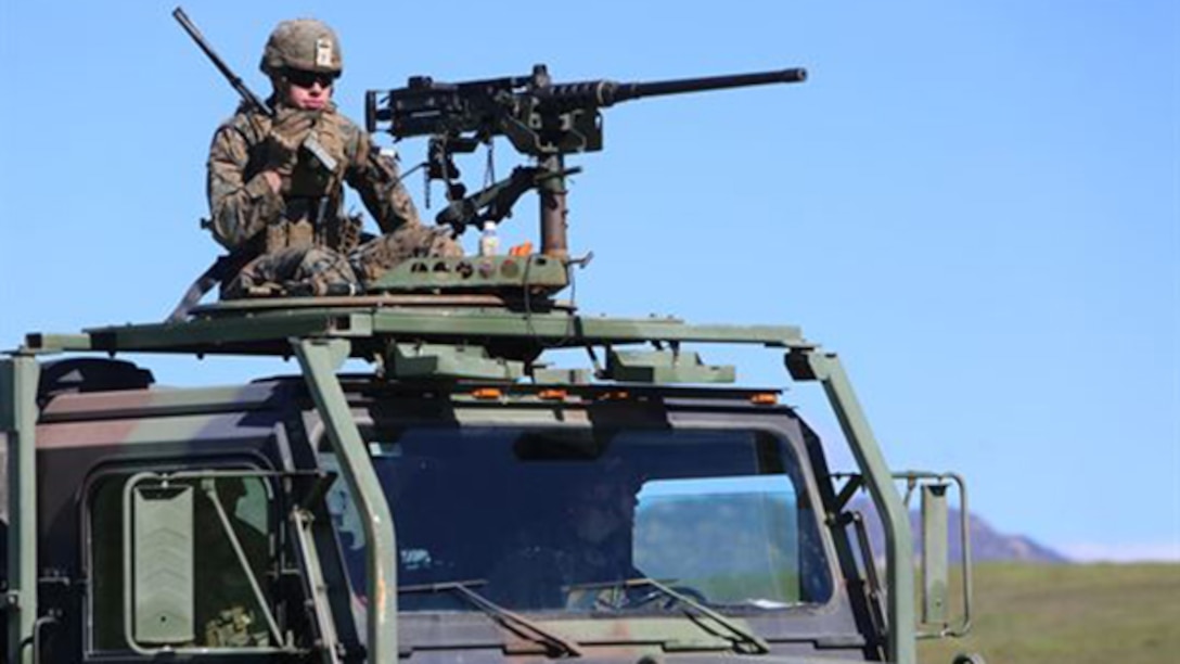 Cpl. Taylor Barnes, a motor transport operator with 2nd Platoon, Truck Company, Headquarters Battalion, 1st Marine Division reports information from the front vehicle to the rest of the vehicles during a convoy operations training exercise aboard Marine Corps Base Camp Pendleton, California, March 3, 2015. Relaying information is an essential part of keeping every Marine vigilant and aware of the environment and terrain around them. 