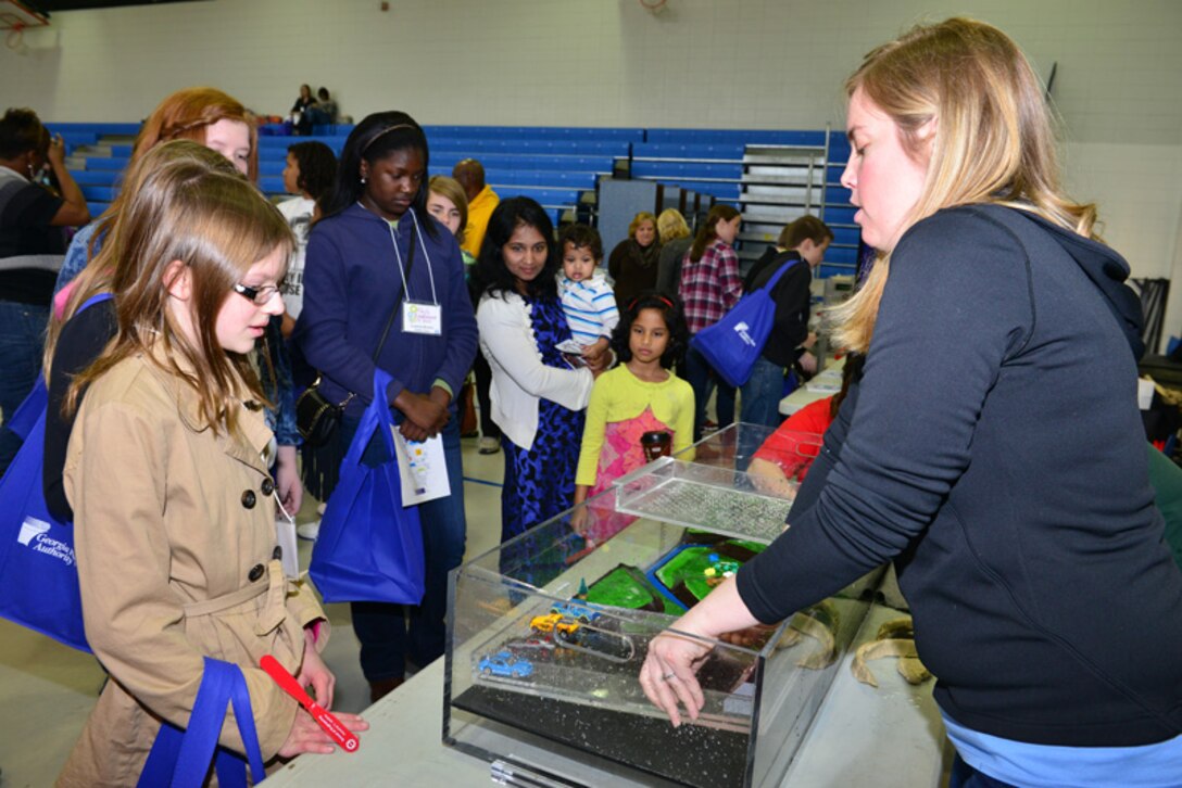 Held at Woodville Tompkins Technical and Career High School, Girls Engineer It Day attracted hundreds of area middle and high school students who learned about career opportunities in the STEM fields. Savannah District volunteers Sarah Wise, Sherelle Reinhardt and Beth Williams brought an interactive wetlands model, which demonstrated how dams and levees are used to mitigate flooding and manage water resources. 