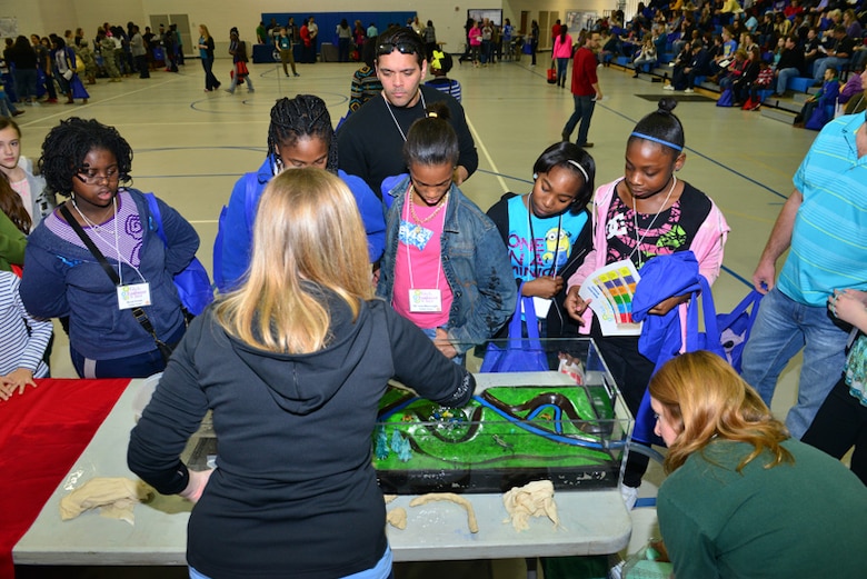 Held at Woodville Tompkins Technical and Career High School, Girls Engineer It Day attracted hundreds of area middle &amp; high school students who learned about career opportunities in the STEM fields. Savannah District volunteers Sarah Wise, Sherelle Reinhardt and Beth Williams brought an interactive wetlands model, which demonstrated how dams and levees are used to mitigate flooding and manage water resources