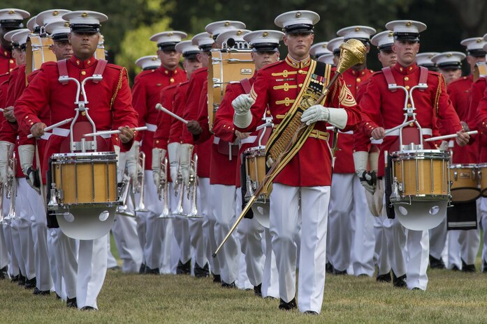 U.S. MARINE CORPS BATTLE COLOR DETACHMENT TO PEFORM AT MCRD SAN DIEGO (Saturday, March 14, 2015 at 2:30 p.m.) - 

The Marine Corps Battle Color Detachment will perform at Marine Corps Recruit Depot San Diego on Saturday March 14, 2015 at 2:30 p.m. The performance is free and open to the public.

The detachment is comprised of three units from Marine Barracks Washington, D.C., which include: The "Commandant's Own," U.S. Marine Drum & Bugle Corps, The Silent Drill Platoon, and The Official Marine Corps Color Guard.

Come see all the pomp and circumstance and share in the proud heritage of the United States Marine Corps!

*Participants should enter through Gate 5 on Washington Street off Interstate Highway 5. A valid driver's license, proof of insurance and proof of registration is needed. All vehicles are subject to search. Please do not bring alcohol, drugs, weapons, glass containers or pets.

PHOTO CAPTION: Washington, D.C. - The United States Marine Drum & Bugle Corps performs during a Tuesday Sunset Parade at the Marine Corps War Memorial in Arlington, Va., July 1. Official Marine Corps photo by Cpl. Larry Babilya/Released)