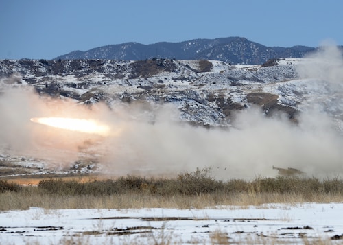 Fort Carson, Colo. – U.S. Army Soldiers from the 1st Battalion, 14 Field Artillery, 214th Fires Brigade, fire a rocket from a M142 High Mobility Artillery Rocket System, Ft. Carson, Colo., March 6, 2015. Twelve rockets were fired in total during a joint exercise training, with the Air Force and Army to stay proficient in transporting, setting up and firing a HIMAR for real-world situations. (U.S. Air Force photo by Airman 1st Class Nathan Clark/Released)