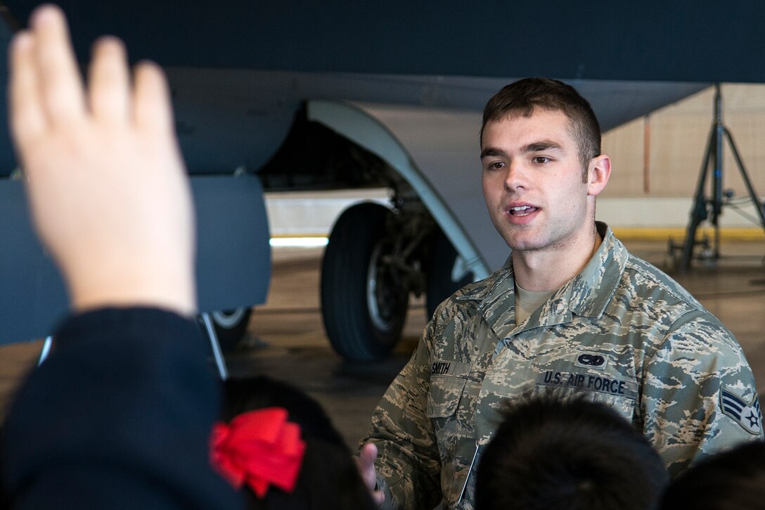 U.S. Air Force Senior Airman Austin Smith, 2nd Maintenance Squadron phase inspection apprentice, takes questions from STARBASE students during a tour on Mar. 6, 2015, Barksdale Air Force Base, La. STARBASE is a premiere Department of Defense science, technology, engineering and mechanics program sponsored by the 307th Bomb Wing of the Air Force Reserve Command. (U.S. Air Force photo by Master Sgt. Greg Steele/Released)