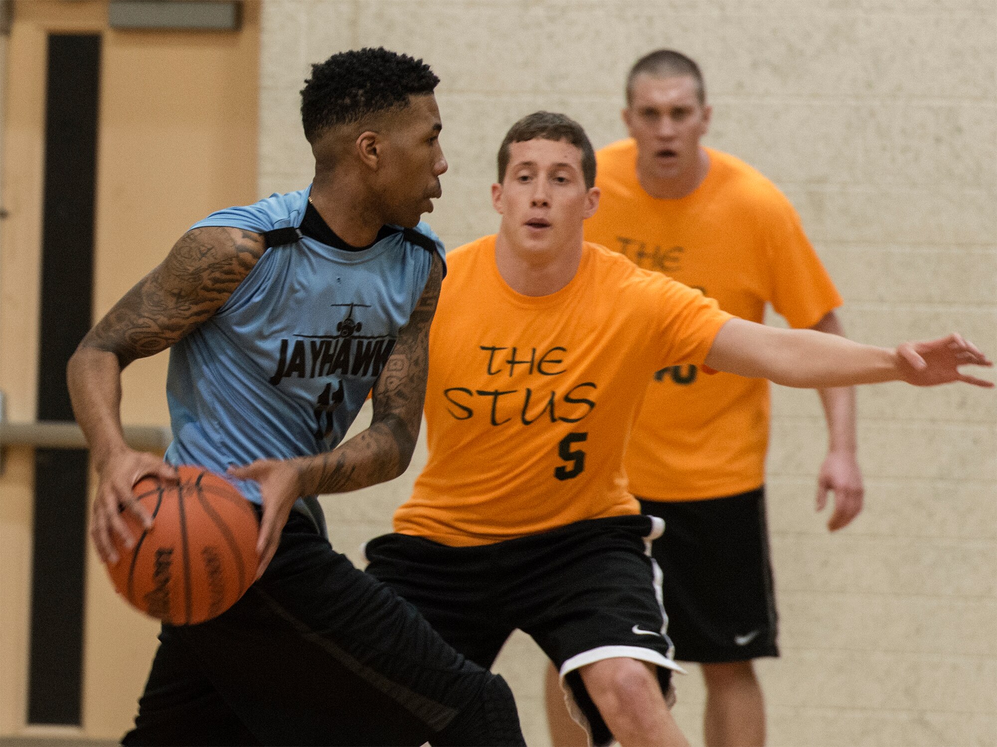 VANCE AIR FORCE BASE, Okla. -- 3rd Flying Training Squadron Jayhawk Ricky Rivers looks for an open teammate at Bradley Fitness and Sports Center, Feb. 25. (U.S. Air Force photo / David Poe)