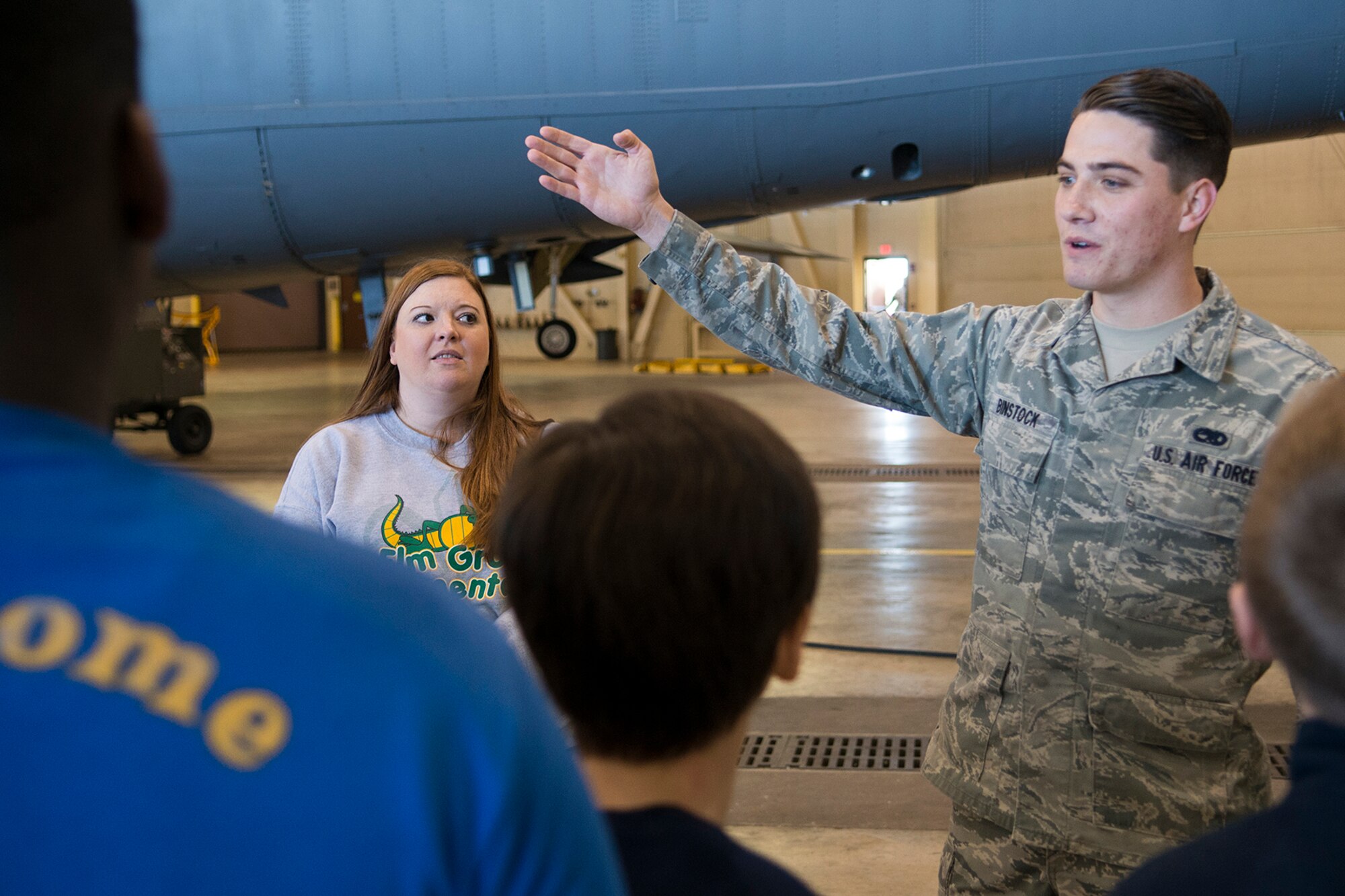 STARBASE students and teachers are given a tour of a B-52H Stratofortress undergoing Phase inspections on Mar. 6, 2015, Barksdale Air Force Base, La. STARBASE provides area 5th graders with a 25 hour hands-on/minds-on environment that actively engages students to explore science, technology, engineering and mathematics to excite their interest, develop a solid concept base and encourage pursuit of these four fields in future careers. (U.S. Air Force photo by Master Sgt. Greg Steele/Released)