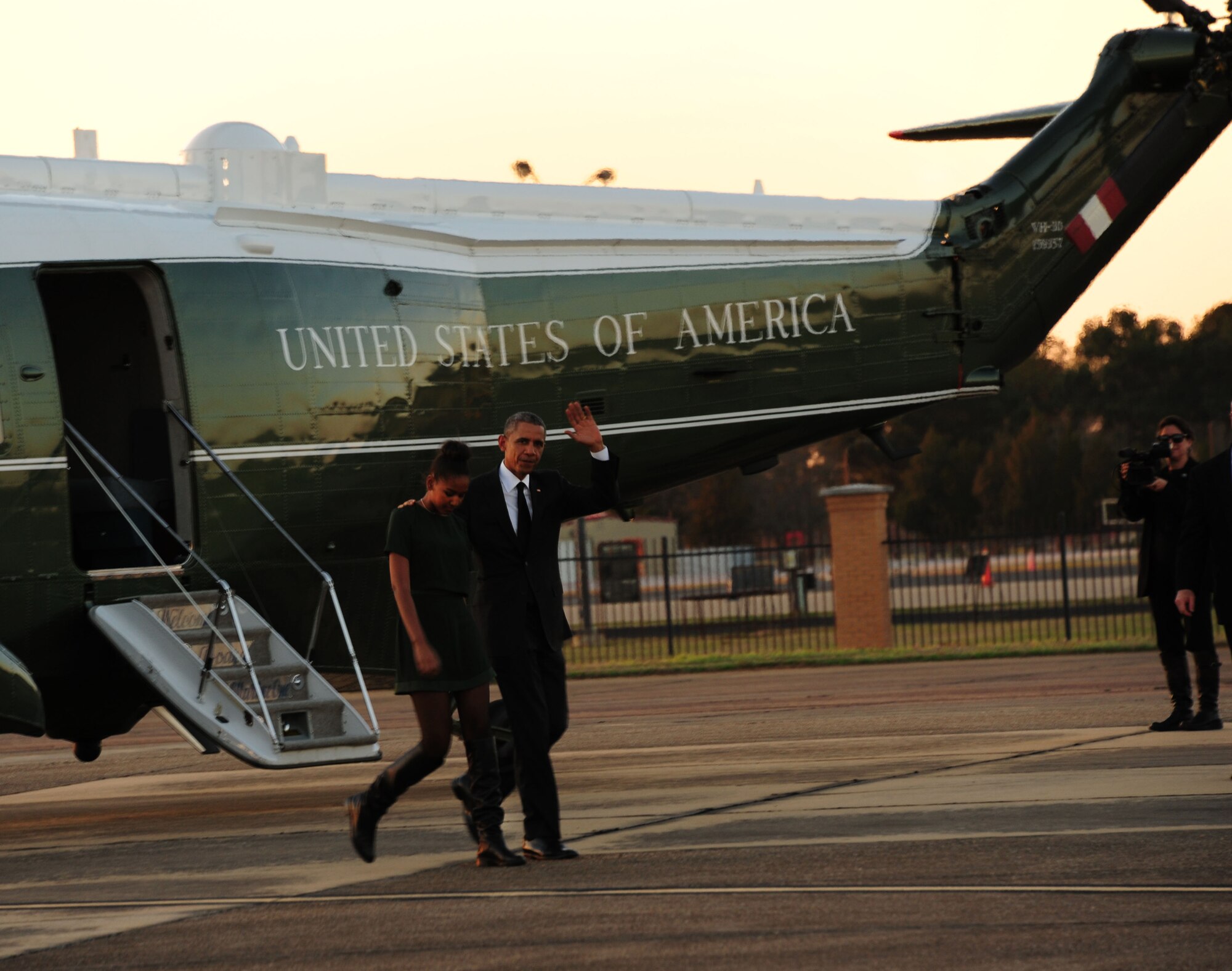President Barack Obama with his daughter Sasha waives to Airmen as they depart Marine One on the first family’s return from Selma, Alabama, March 7, 2015, at Maxwell Air Force Base, Alabama. Obama delivered a speech and crossed the Edmund Pettus Bridge during the 50th anniversary of ‘Bloody Sunday, 'which led to the March 21, 1965, successful march from Selma to Montgomery for equal voting rights. (U.S. Air Force photo by Airman 1st Class Alexa Culbert)