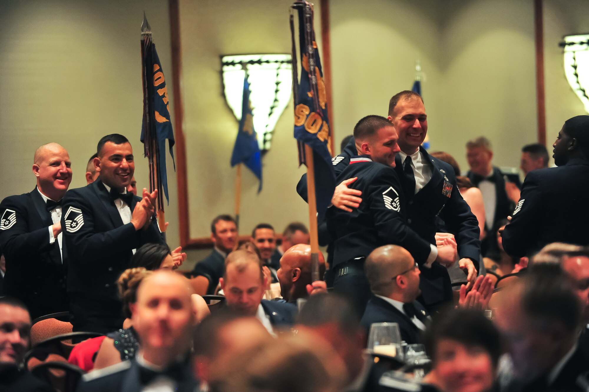 Air Force Reservists from the 310th Security Forces Squadron celebrate as one of their own wins an award March 6, 2015, during the 310th Space Wing's Annual Awards Banquet at the Cheyenne Mountain Resort in Colorado Springs, Colo. The wing sponsored the event to both recognize its annual award winners and bring Reservists together to enjoy an evening of esprit de corps, unit morale and camaraderie.
(U.S. Air Force photo/Tech. Sgt. Nicholas B. Ontiveros)