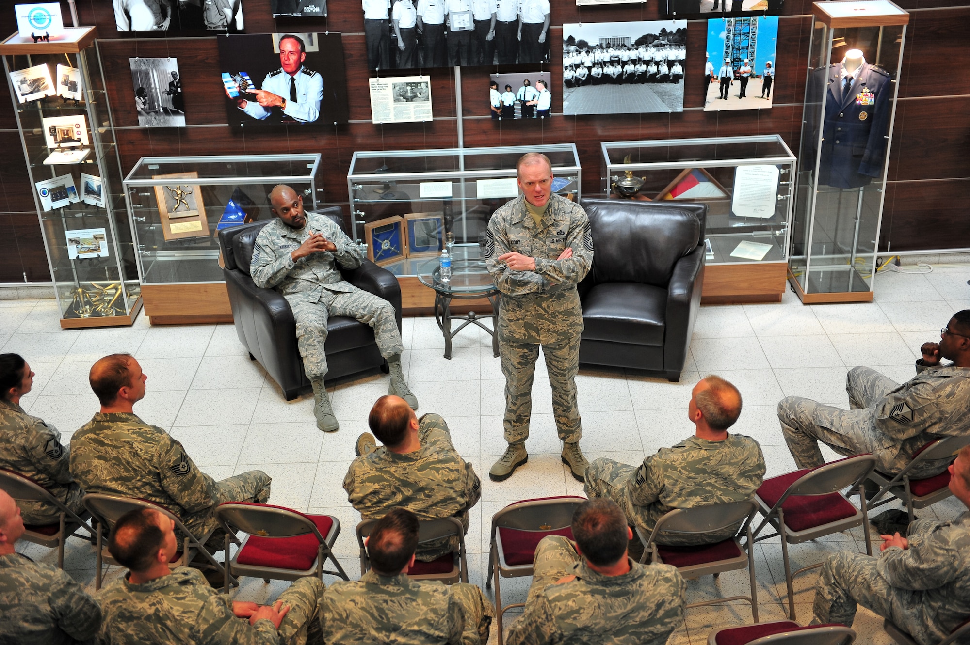 Chief Master Sgt. of the Air Force James A. Cody speaks with Airmen of the Reserve National Security Space Institute during a guided tour March 7, 2015, at Peterson Air Force Base, Colo. This was part of Cody's two-day visit with the 310th Space Wing. Cody also answered their questions and recognized their contributions to the 310th SW.
(U.S. Air Force photo/Tech. Sgt. Nicholas B. Ontiveros)