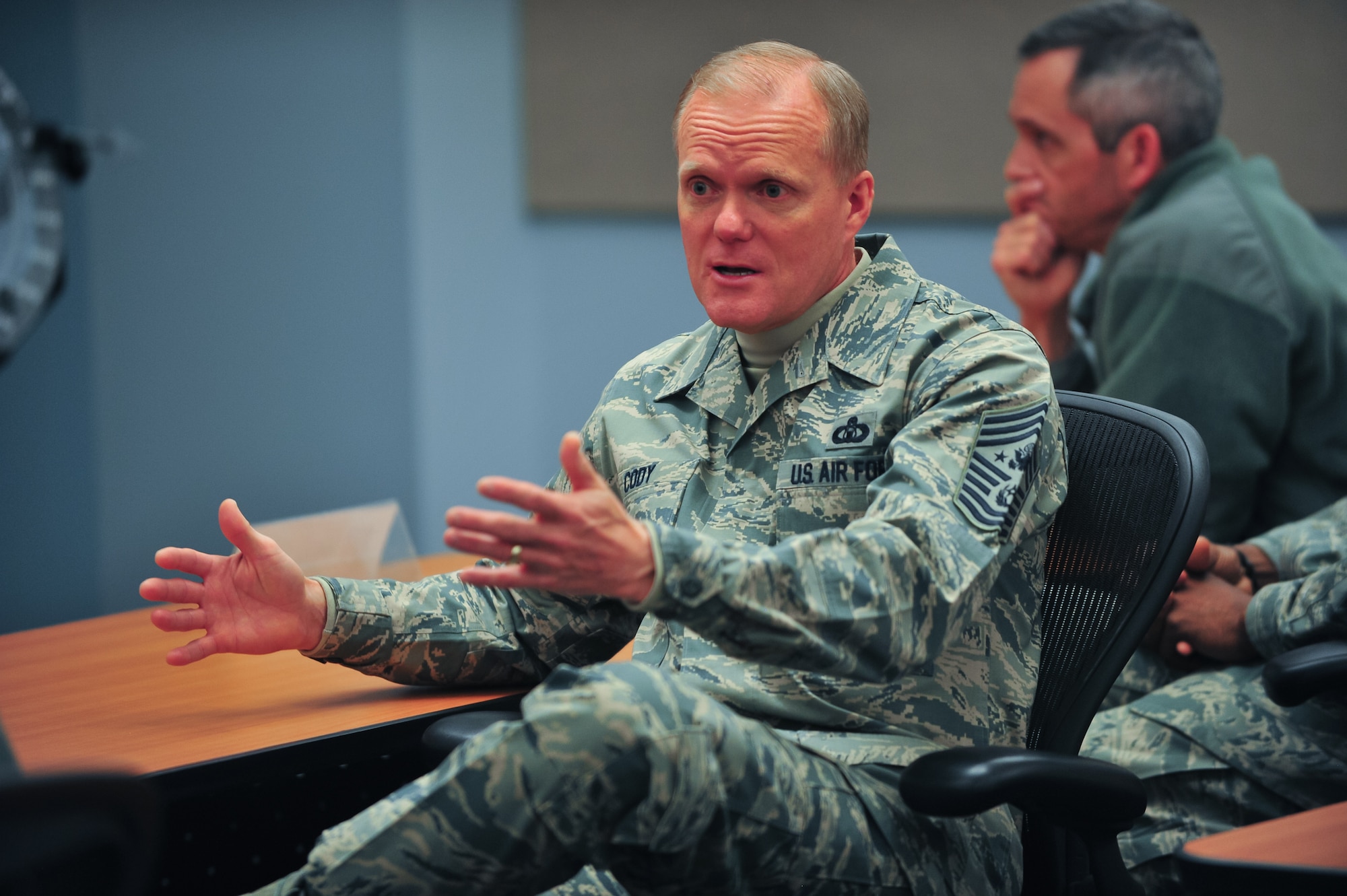 Chief Master Sgt. of the Air Force James A. Cody speaks with Airmen during a guided tour March 7, 2015, at Peterson Air Force Base, Colo. Cody also answered their questions and recognized their contributions to the 310th SW during his two-day visit.
(U.S. Air Force photo/Tech. Sgt. Nicholas B. Ontiveros)