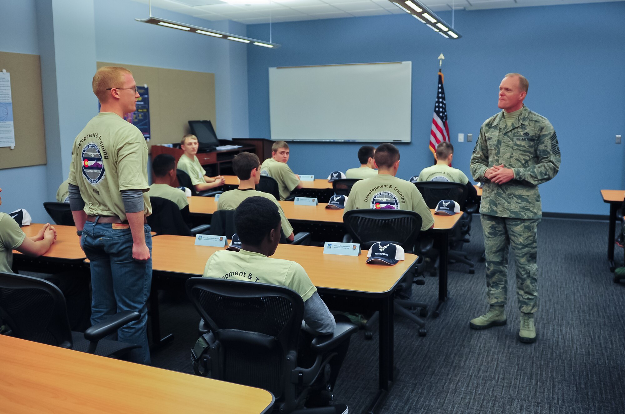 Chief Master Sgt. of the Air Force James Cody listens to a question from a trainee waiting to head out to Basic Military Training (BMT) March 7, 2015, during a guided tour on Peterson Air Force Base, Colo. This was part of Cody's two-day visit with the 310th Space Wing, Schriever Air Force Base, Colo. Cody gave them a realistic insight to BMT, and how they'll be tested while performing many tasks under stress.
(U.S. Air Force photo/Tech. Sgt. Nicholas B. Ontiveros)