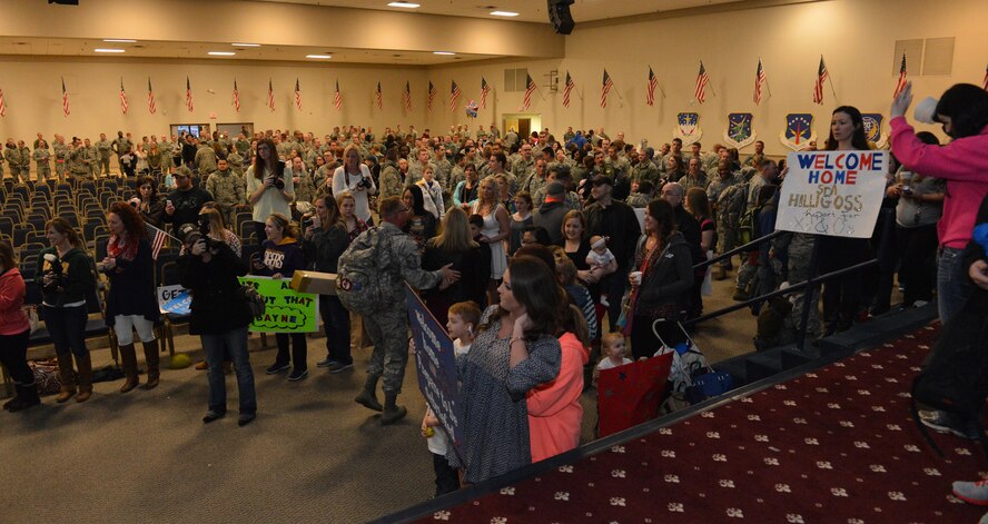 Family members greet 2nd Bomb Wing Airmen on Barksdale Air Force Base, La., March 9, 2015. Airmen from the 2nd Maintenance Group, 2nd Operations Support Squadron and 96th Bomb Squadron returned from a six month deployment at Andersen Air Force Base, Guam. (U.S. Air Force photo/Senior Airman Benjamin Gonsier)