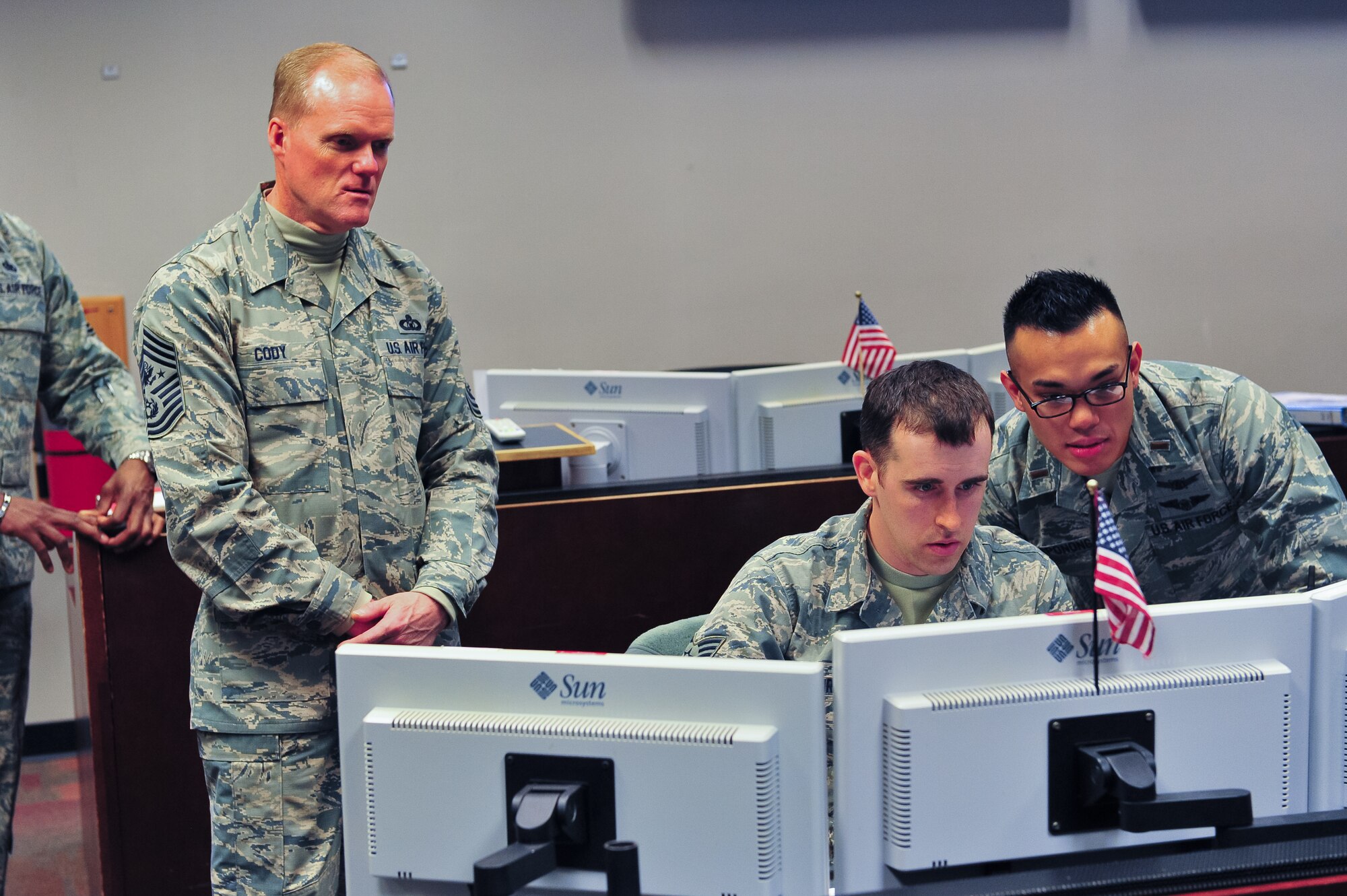 Chief Master Sgt. of the Air Force James A. Cody observes how the Airmen of 19th Space Operations Squadron control the Global Positioning System (GPS) March 6, 2015, during a guided tour of the 310th Space Wing on Schriever Air Force Base, Colo.  Cody spoke to Airmen, answered questions during an all-call and recognized several Airmen for their contributions to the 310th SW during his two-day visit. GPS is a space-based satellite navigation system that provides location and time information in all weather conditions, anywhere on or near the Earth where there is an unobstructed line of sight to four or more GPS satellites.
(U.S. Air Force photo/Tech. Sgt. Nicholas B. Ontiveros)