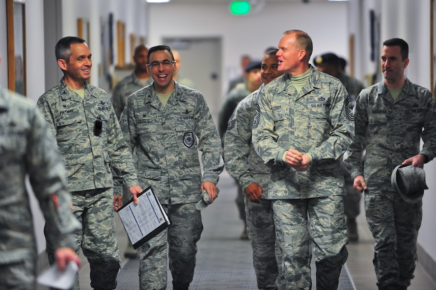 Chief Master Sgt. of the Air Force James A. Cody walks with escorts Air Force Reserve Col. Damon S. Feltman, 310th Space Wing commander and Col. Bill Liquori, 50th Space Wing commander, March 6, 2015, during a guided tour of the 310th Space Wing on Schriever Air Force Base, Colo.  Cody spoke to Airmen, answered questions during an all-call and recognized several Airmen for their contributions to the 310th SW during his two-day visit.
(U.S. Air Force photo/Tech. Sgt. Nicholas B. Ontiveros)