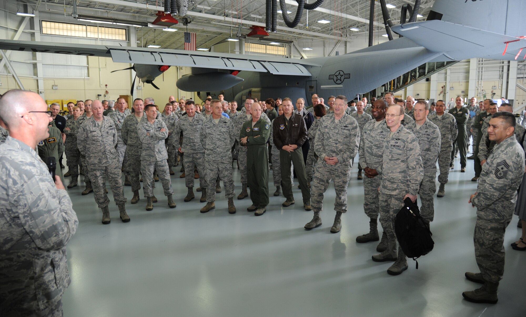 Air Education and Training Command leaders gather for tour instructions during the AETC Senior Leader Conference March 4, 2015, inside the dual bay hangar, Keesler Air Force Base, Miss.  Commanders and chief master sergeants from across AETC attended the conference, which gave senior leaders an opportunity to collaborate and share ideas as they shape the future of the command.  (U.S. Air Force photo by Kemberly Groue)