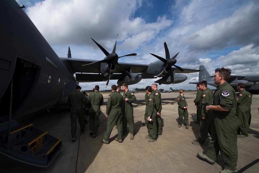 U.S. Air Force Academy cadets view an HC-130J Combat King II at the 71st Rescue Squadron during a tour March 5, 2015, at Moody Air Force Base, Ga. Pilots from the 71st RQS briefed the cadets on the aircraft and its rescue and refueling mission at Moody before the tour. (U.S. Air Force photo by Airman 1st Class Dillian Bamman/Released)