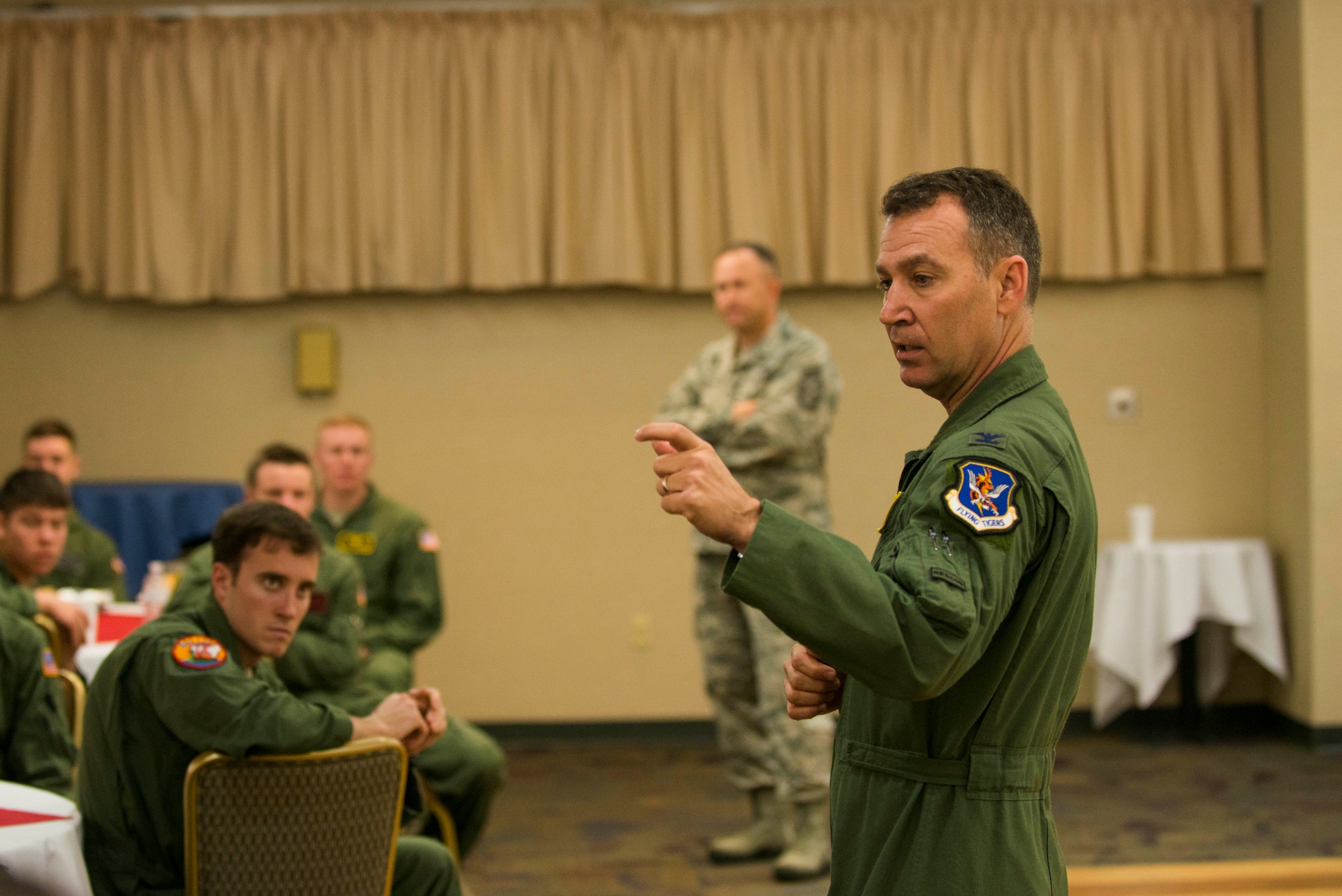 U.S. Air Force Col. Chad Franks, 23d Wing commander, speaks with cadets from Cadet Squadron 9 with the U.S. Air Force Academy, Colo., March 5, 2015, at Moody Air Force Base, Ga. Franks spoke with cadets about the 23d Wing’s mission and priorities, and the cadets’ responsibilities once they commission. (U.S. Air Force photo by Airman 1st Class Dillian Bamman/Released)