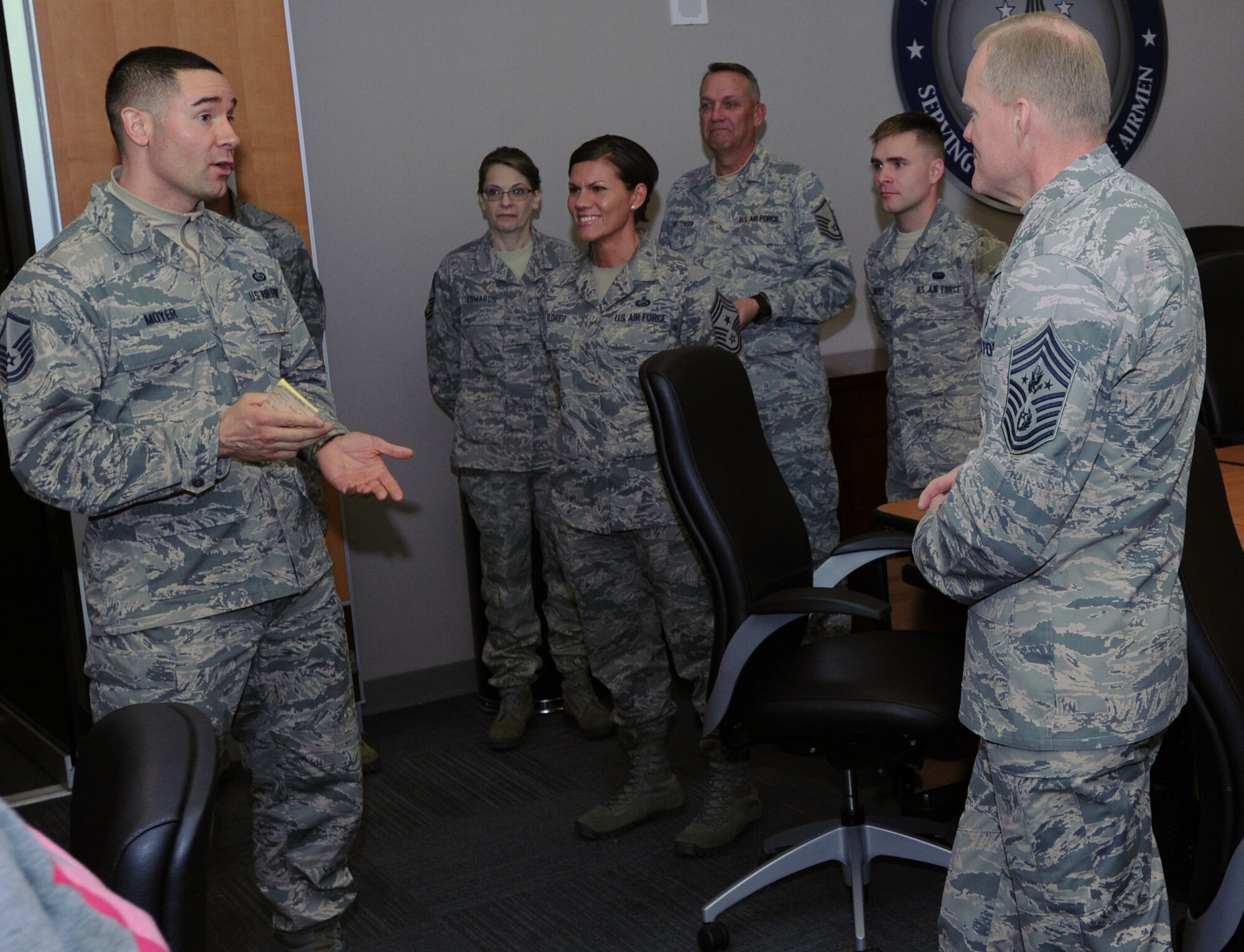 Chief Master Sgt. of the Air Force James A. Cody listens to Master Sgt. William Moyer, Headquarters Individual Reservist Readiness and Integration Organization commander support staff superintendent, during his visit to Air Reserve Personnel Center March 5, 2015, on Buckley Air Force Base, Colo. Cody’s visit focused on the future of the Air Force as he met with Airmen and discussed his role and priorities. (U.S. Air Force photo/Tech. Sgt. Rob Hazelett)