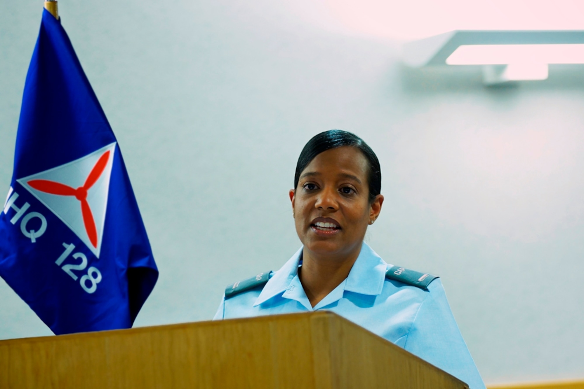 Civil Air Patrol First Lieutenant Shareen Taylor, newly appointed commander of the Mildenhall Cadet Squadron, gives a speech during the Civil Air Patrol unit activation ceremony March 2, 2015, on RAF Mildenhall, England. Civil Air Patrol performs three missions: emergency services, cadet programs and aerospace education. The main mission of RAF Mildenhall’s CAP squadron is to conduct the cadet program, which provides training for cadets consisting of leadership, aerospace education and physical fitness. (Photo by Jesse Taylor/Released)