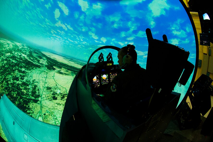 An 81st Fighter Squadron Afghan pilot, trains in the A-29 Super Tucano simulator during U.S. Air Force Gen. Robin Rand’s, Air Education and Training Command commander, visit March, 3, 2015, at Moody Air Force Base, Ga. The Afghan pilots are set to fly an A-29 later this week. (U.S. Air Force photo by Airman 1st Class Ceaira Tinsley/Released)