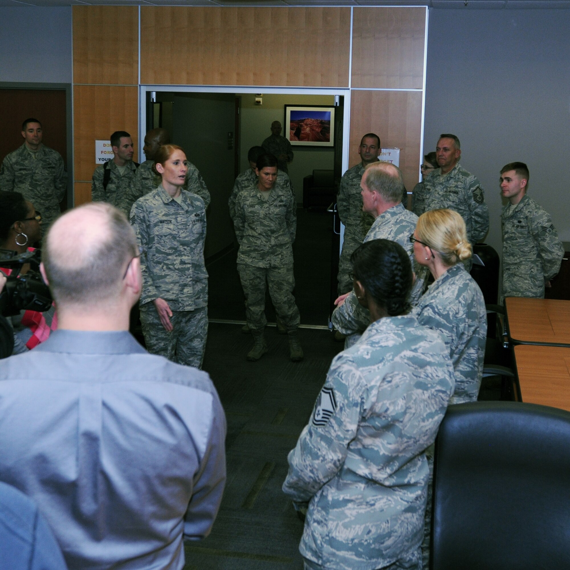 Chief Master Sgt. of the Air Force James A. Cody listens to Staff Sgt. Amanda Watson, Air Reserve Personnel Center promotion eligibility division NCO in charge, during his visit to ARPC March 5, 2015, on Buckley Air Force Base, Colo. Cody’s visit focused on the future of the Air Force as he met with Airmen and discussed his role and priorities. (U.S. Air Force photo/Tech. Sgt. Rob Hazelett)