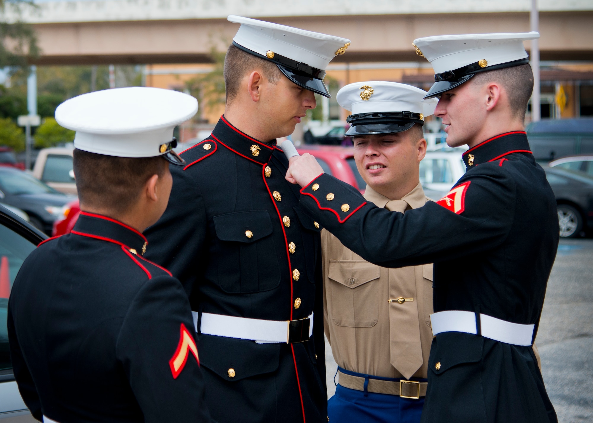 Private 1st Class Robert Boodro gets some grooming help with his “costume” from his fellow Marines before entering this year’s large-scale comic book convention, Pensacon, Feb. 28.  More than 20,000 people, including military from all five of the region’s bases, attended the convention at the Pensacola Bay Center Feb. 27 – March 1.  (U.S. Air Force photo/Samuel King Jr.) 