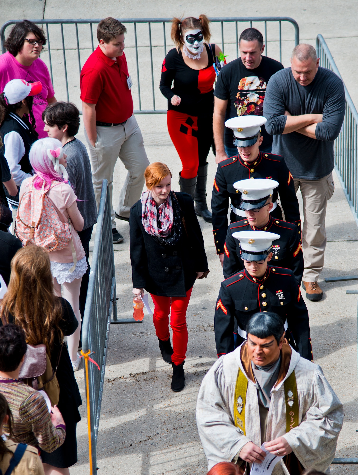 Marines in service dress uniforms wait in line alongside a Star Trek character and Harley Quinn Feb. 28 at this year’s large-scale comic book convention, Pensacon.  More than 20,000 people, including military from all five of the region’s bases, attended the convention at the Pensacola Bay Center Feb. 27 – March 1.  (U.S. Air Force photo/Samuel King Jr.)