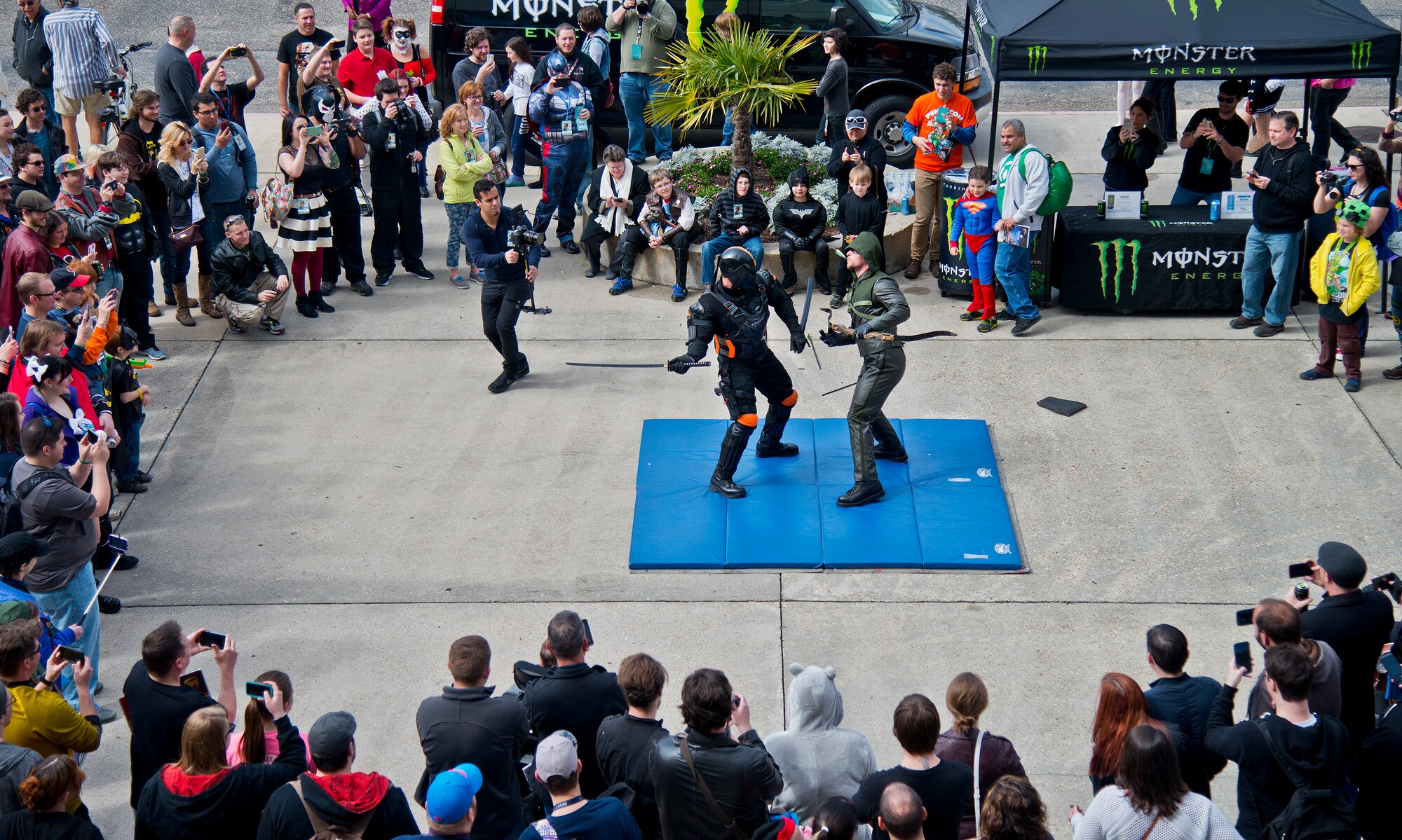 Deathstroke and Green Arrow put on a fighting demonstration during this year’s large-scale comic book convention, Pensacon, Feb. 28.  More than 20,000 people, including military from all five of the region’s bases, attended the convention at the Pensacola Bay Center Feb. 27 – March 1.  (U.S. Air Force photo/Samuel King Jr.)