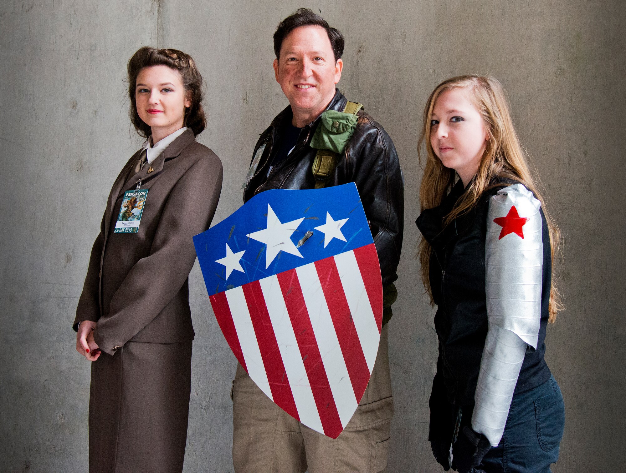 A patriotic family dresses up in their best Captain America costumes for this year’s large-scale comic book convention, Pensacon, Feb. 28.  More than 20,000 people, including military from all five of the region’s bases, attended the convention at the Pensacola Bay Center Feb. 27 – March 1.  (U.S. Air Force photo/Samuel King Jr.)