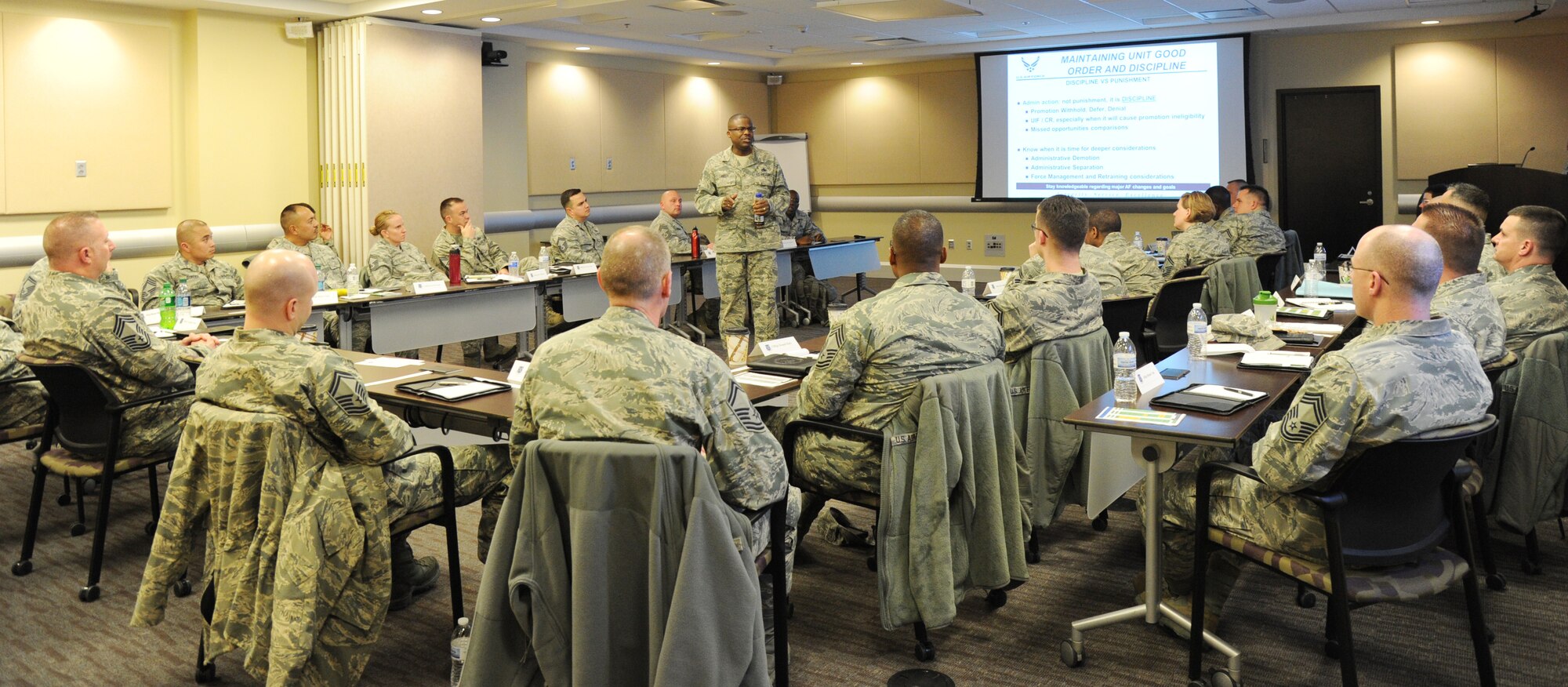 Chief Master Sgt. Henry Hayes, Jr., addresses 29 of the National Capital Region’s newest chief selects and promotees during the Air Force District of Washington’s Chief Orientation Seminar at Joint Base Andrews, Maryland, March 2, 2015. The course attendees include active duty Airmen, Guard, and Reservists who work across the NCR along with some of AFDW’s geographically separated chief selects. Hayes is the AFDW first sergeant. (U.S. Air Force photo/Master Sgt. Tammie Moore)
