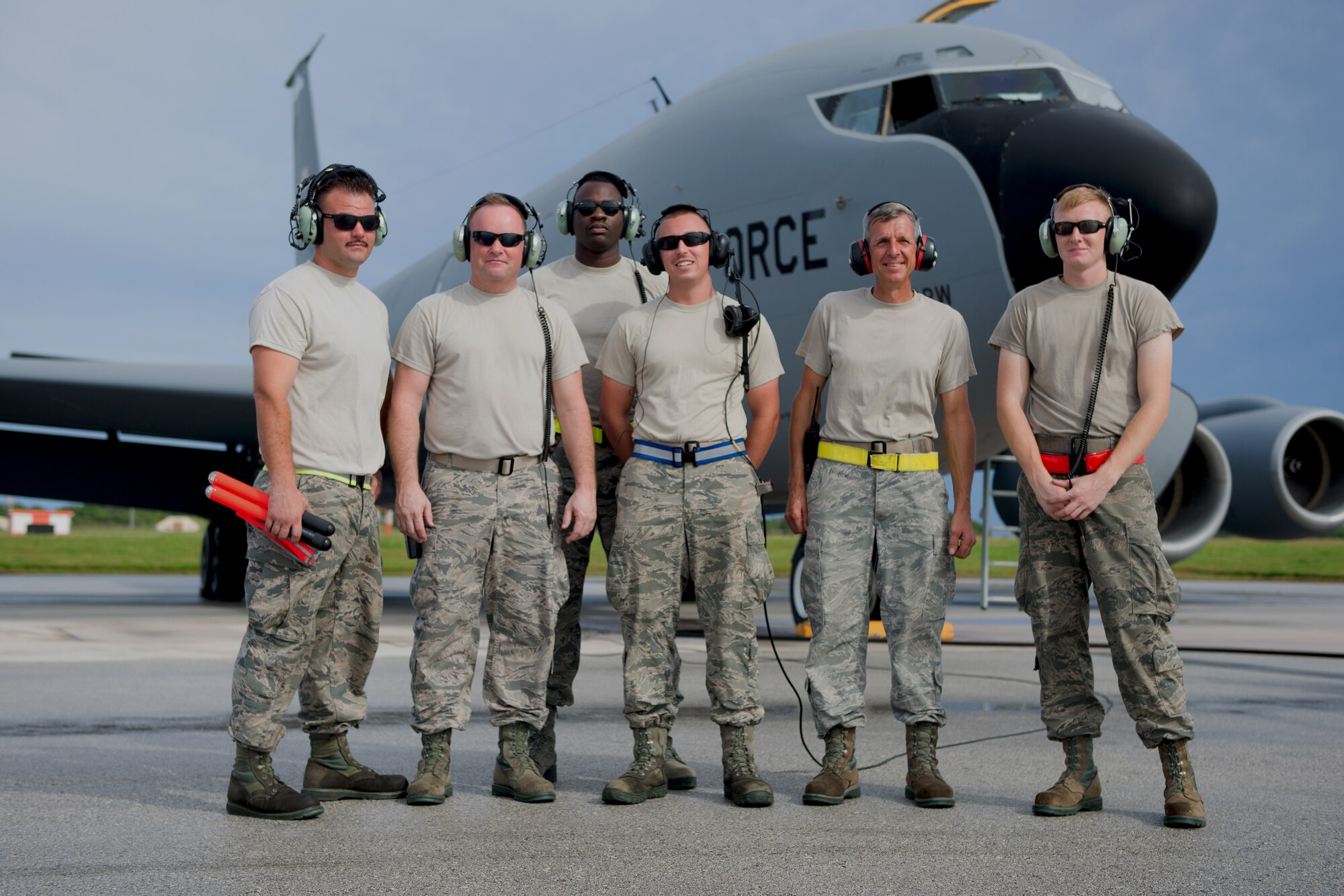 U.S. Air Force airmen deployed to the 506th Expeditionary Air Refueling Squadron, Guam, from the 157th Air Refueling Wing, N.H. and the 186th Air Refueling Wing, M.S. pose for a group photo in-front of a KC-135. The airmen had just completed preflight inspections on the KC-135 Stratotanker, which is deployed from the 157 ARW. (U.S. Air National Guard photo by Senior Airman Kayla McWalter/RELEASED)