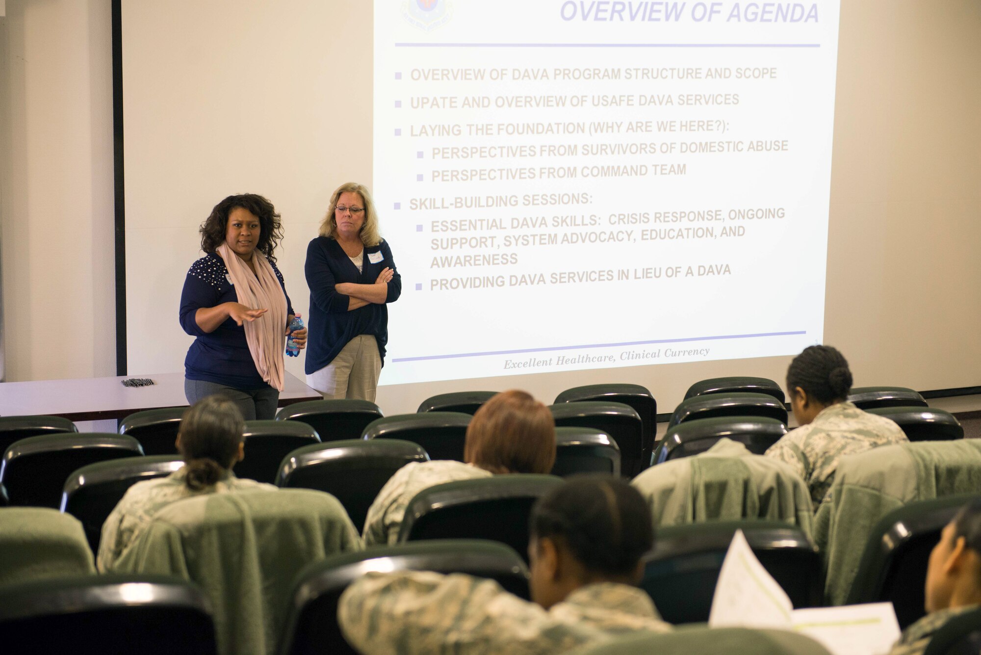 RAMSTEIN AIR BASE, Germany – Deidra Saina, Air Force Domestic Abuse Victim Advocate coordinator, (left) and Pam Collins, Air Force Family Advocacy Program clinical director, brief Family Advocacy officers on providing victim advocacy services at their bases during a conference at Ramstein Air Base, Germany, Feb. 26, 2015. About 30 Family Advocacy Officers from across U.S. Air Forces in Europe and Air Forces Africa attended the conference to refresh their skills for providing advocacy to victims of domestic abuse. In addition to the base services, American Overseas can contact the domestic violence crisis center toll-free 866-USWOMEN or through live chat at www.866uswomen.org. (U.S. Air Force photo/Tech. Sgt. Benjamin Wilson)